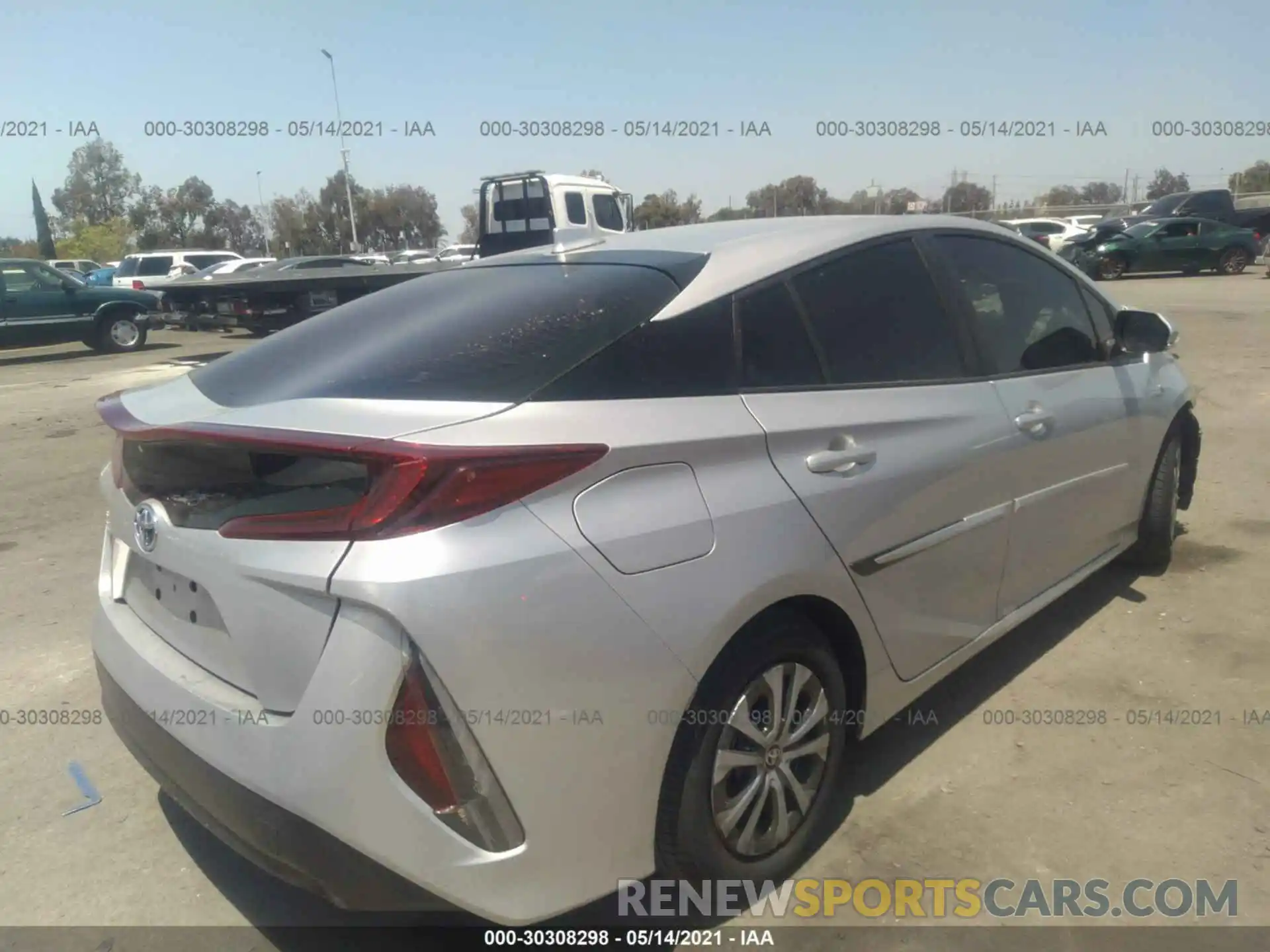 4 Photograph of a damaged car JTDKAMFP3M3185067 TOYOTA PRIUS PRIME 2021