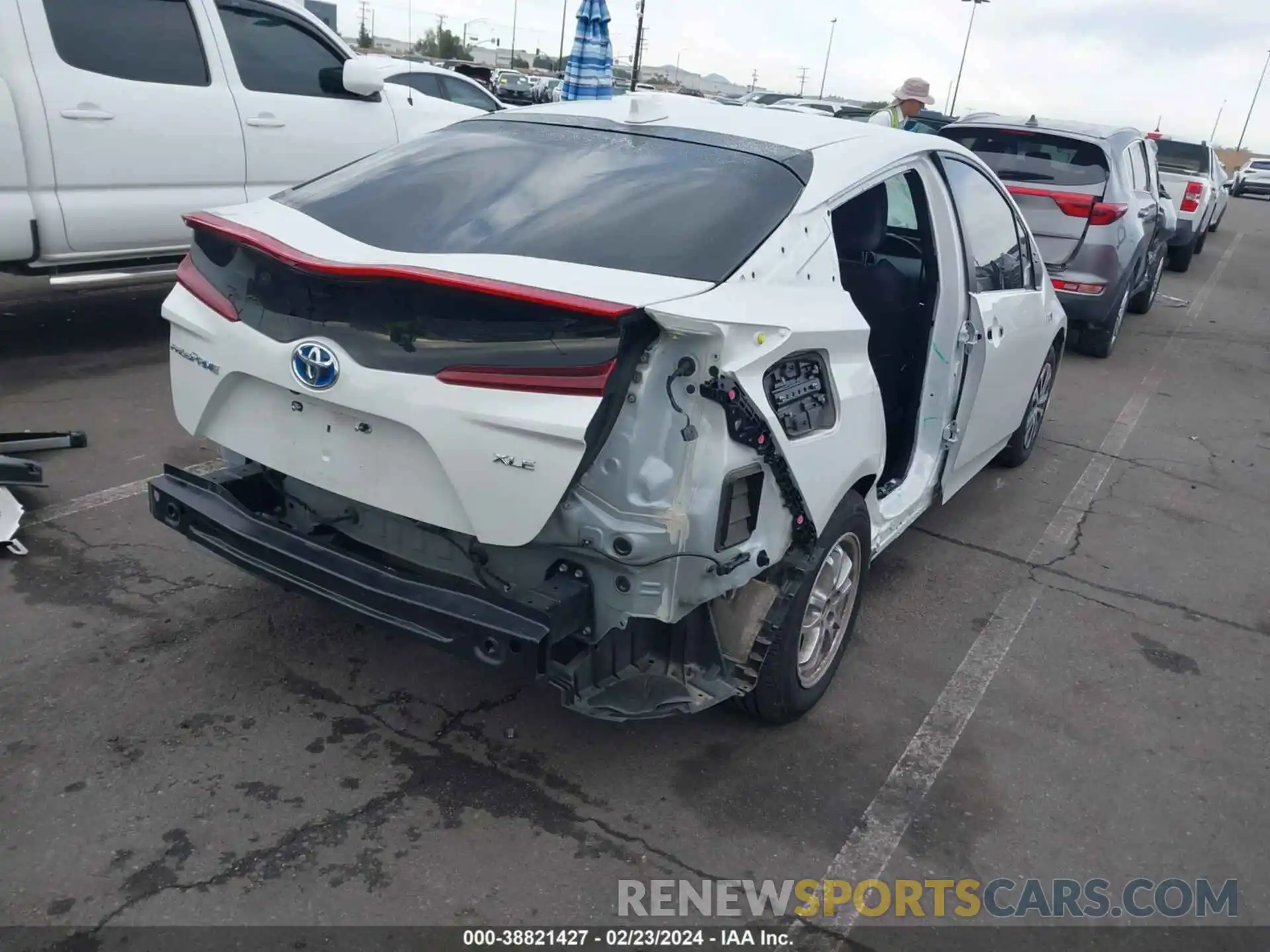 4 Photograph of a damaged car JTDKAMFP3M3185716 TOYOTA PRIUS PRIME 2021