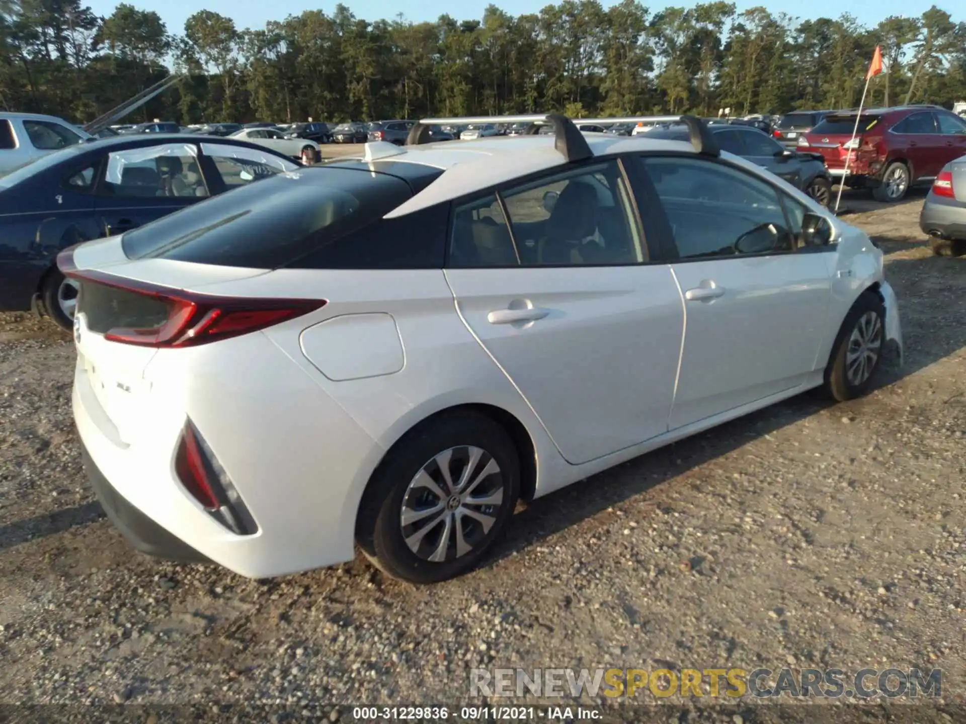 4 Photograph of a damaged car JTDKAMFP4M3193131 TOYOTA PRIUS PRIME 2021