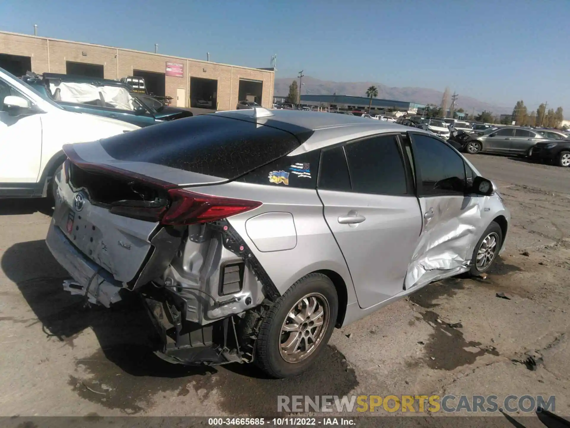 4 Photograph of a damaged car JTDKAMFP5M3172448 TOYOTA PRIUS PRIME 2021