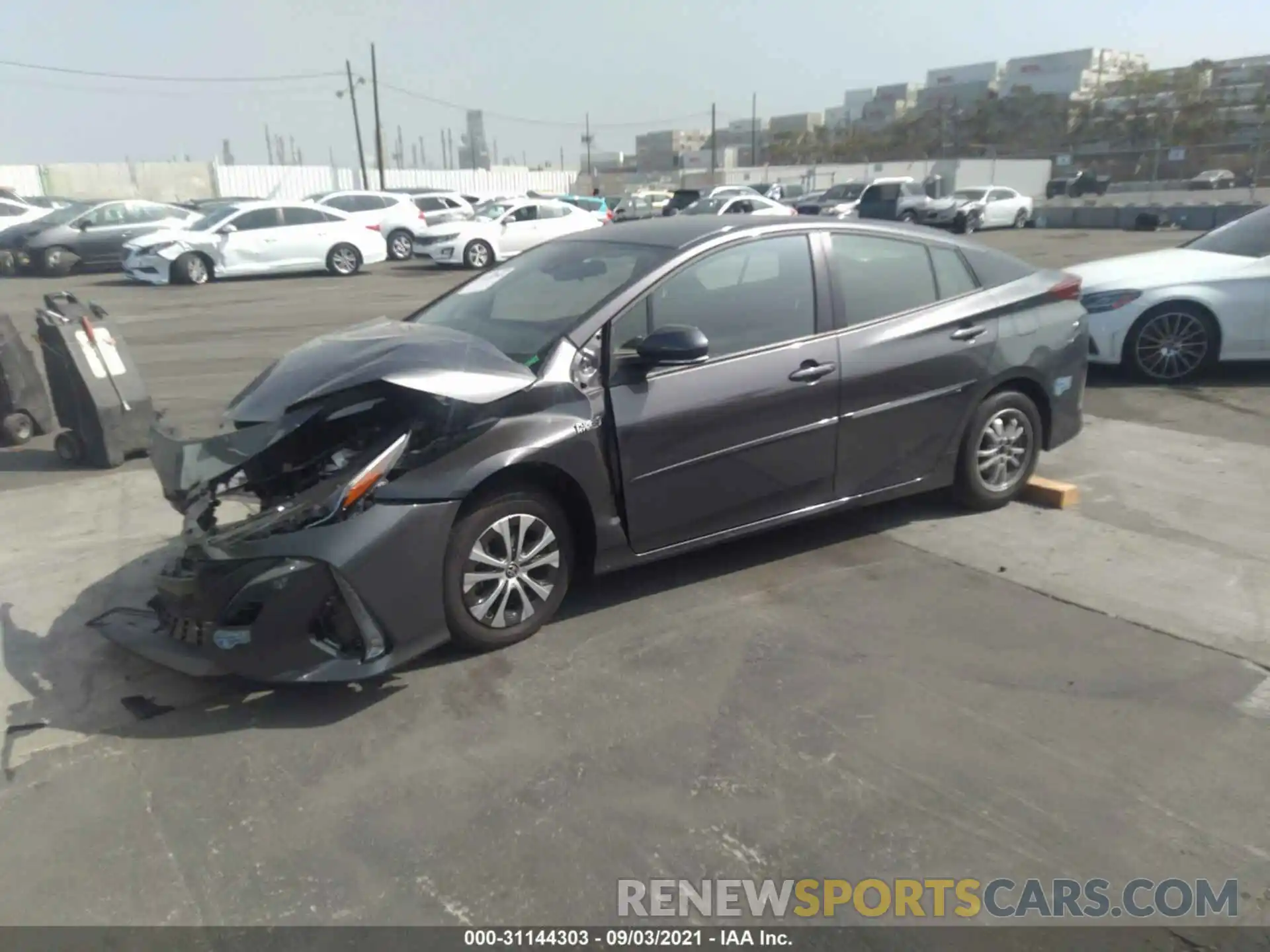 2 Photograph of a damaged car JTDKAMFP5M3184177 TOYOTA PRIUS PRIME 2021