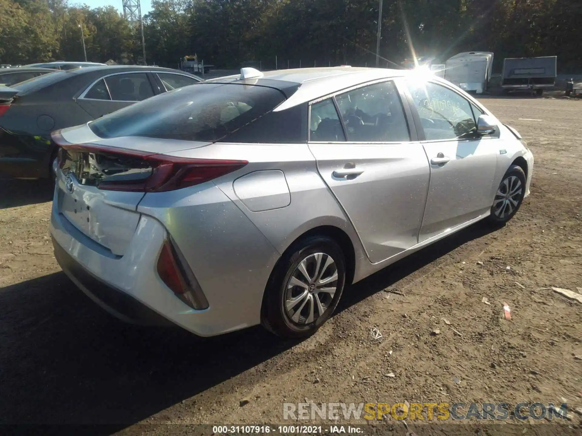 4 Photograph of a damaged car JTDKAMFP5M3192456 TOYOTA PRIUS PRIME 2021