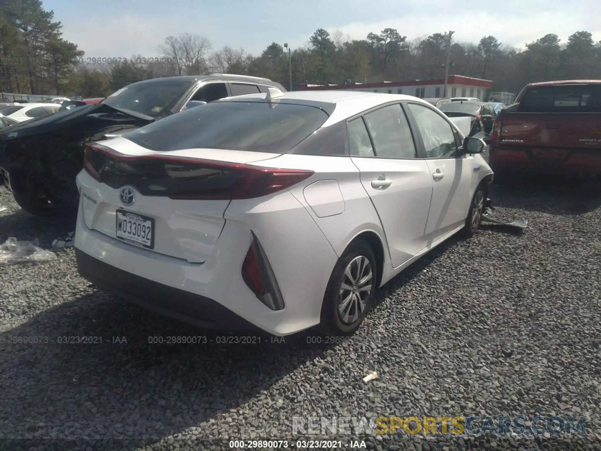 4 Photograph of a damaged car JTDKAMFP6M3176203 TOYOTA PRIUS PRIME 2021