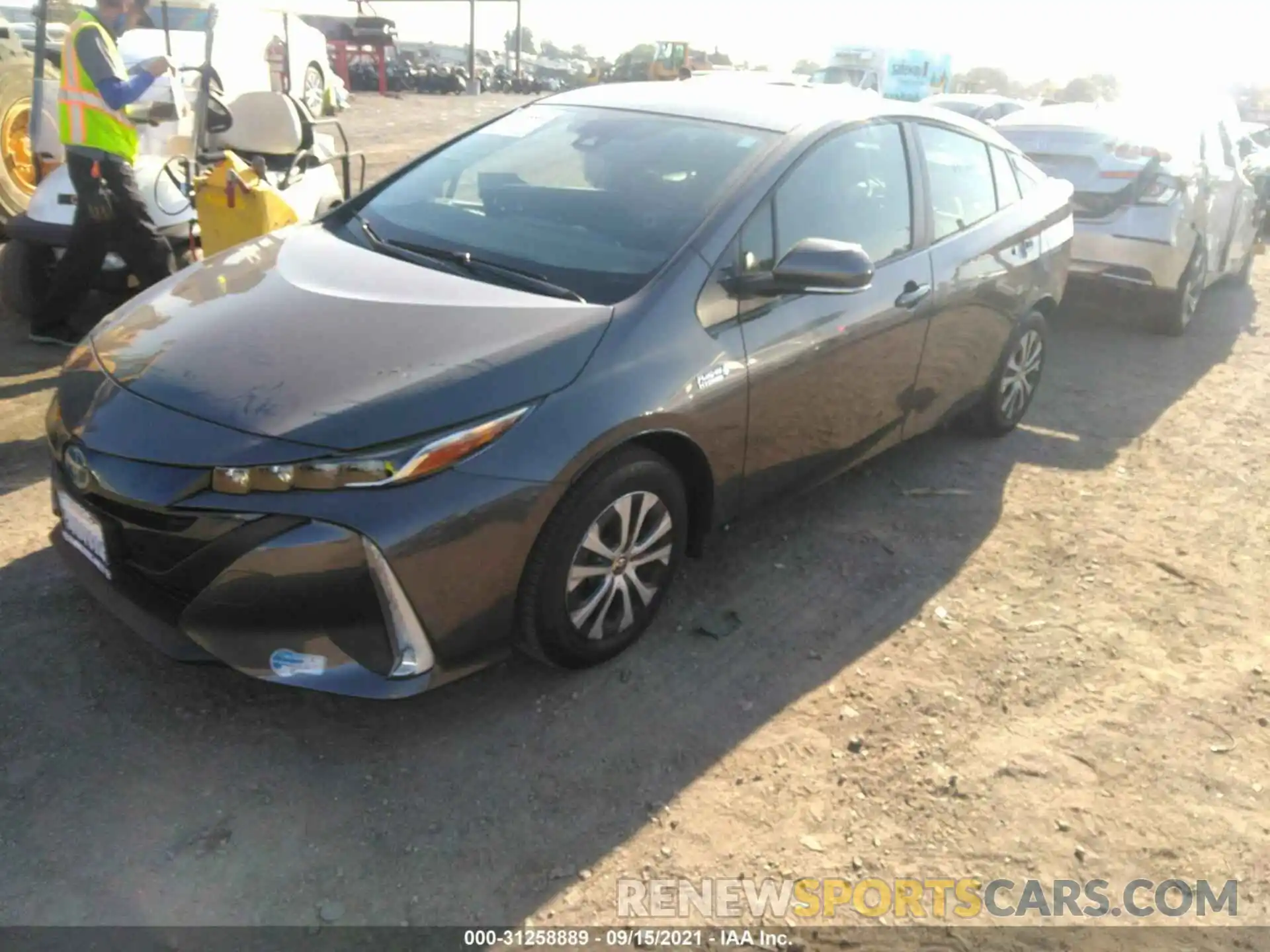 2 Photograph of a damaged car JTDKAMFP6M3187699 TOYOTA PRIUS PRIME 2021