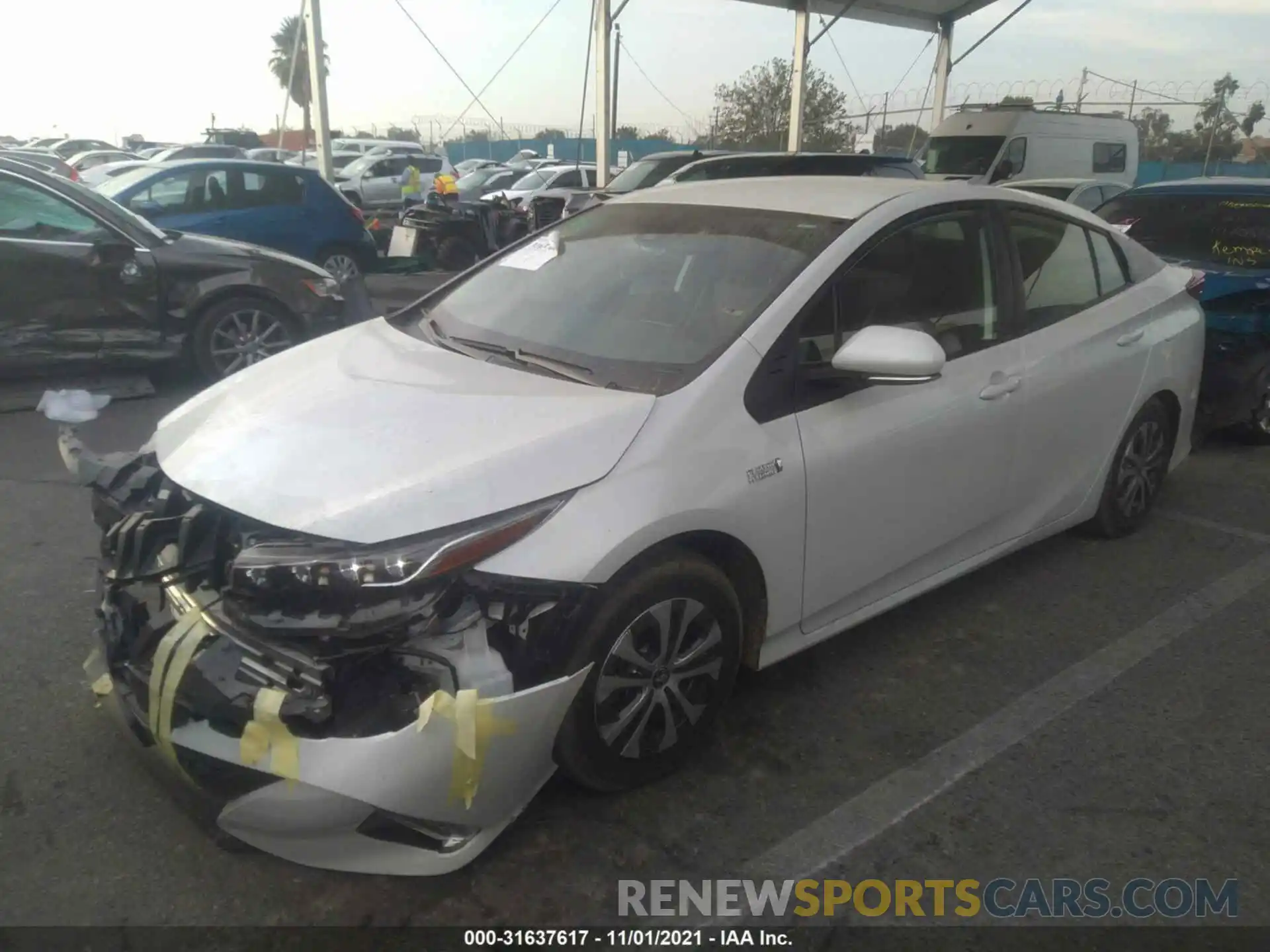 2 Photograph of a damaged car JTDKAMFP6M3191509 TOYOTA PRIUS PRIME 2021