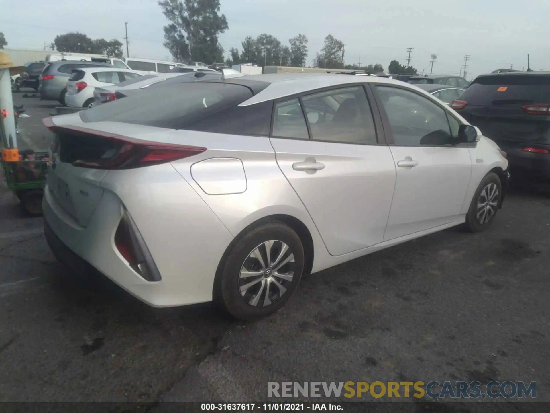 4 Photograph of a damaged car JTDKAMFP6M3191509 TOYOTA PRIUS PRIME 2021