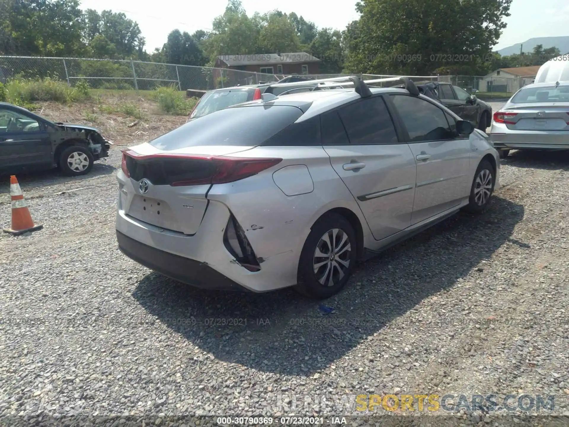 4 Photograph of a damaged car JTDKAMFP7M3173021 TOYOTA PRIUS PRIME 2021