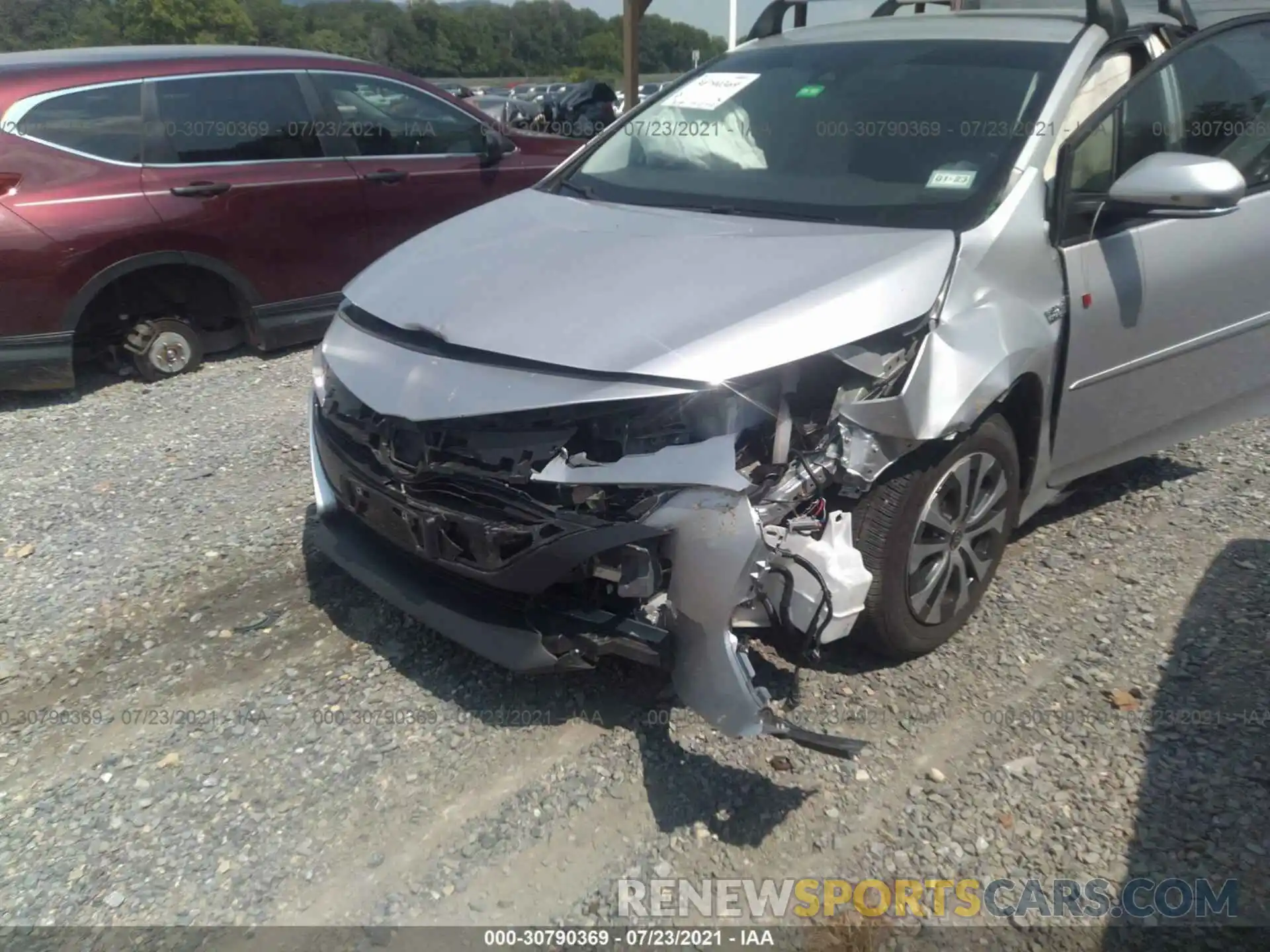 6 Photograph of a damaged car JTDKAMFP7M3173021 TOYOTA PRIUS PRIME 2021