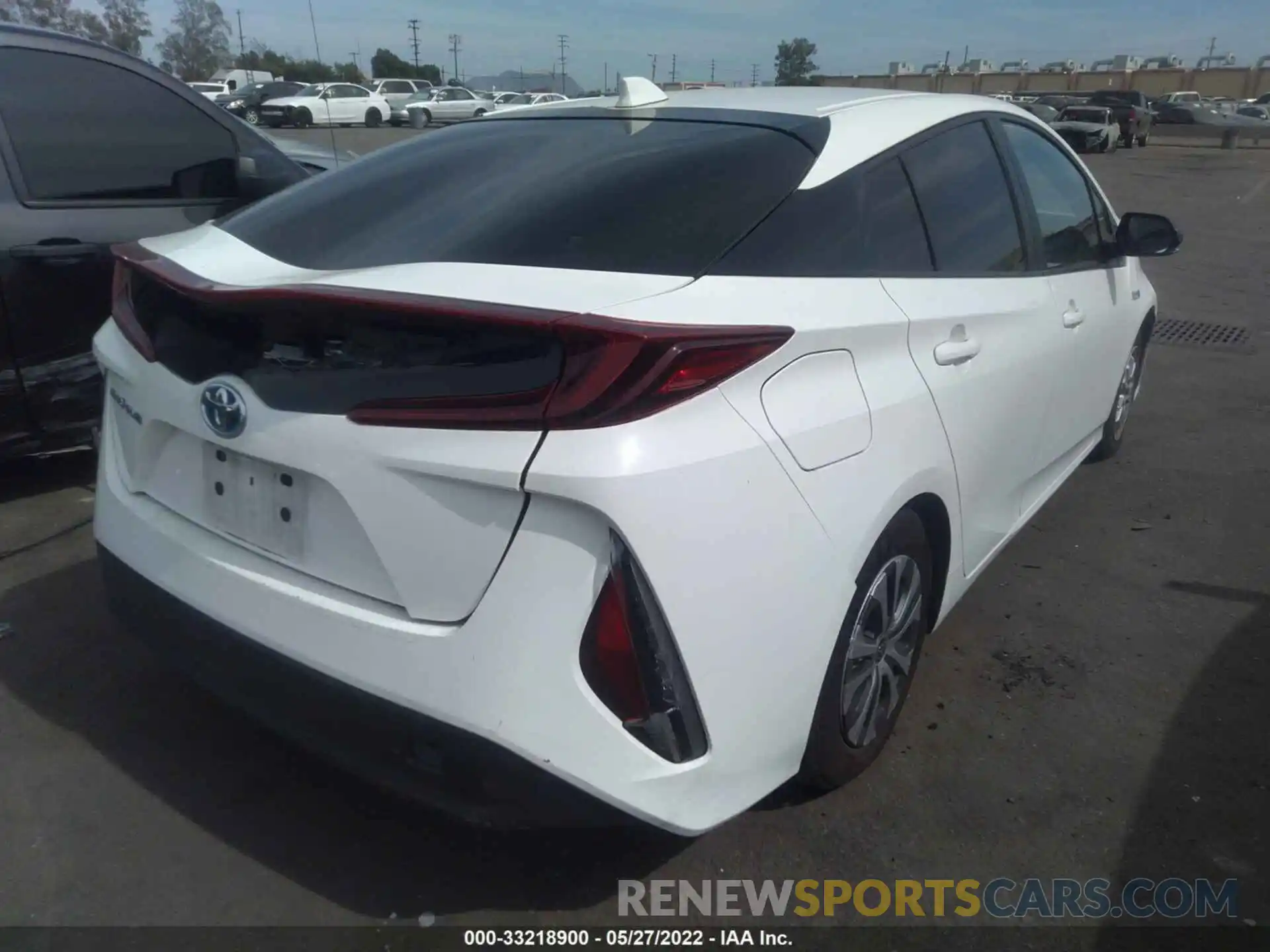 4 Photograph of a damaged car JTDKAMFP7M3182348 TOYOTA PRIUS PRIME 2021