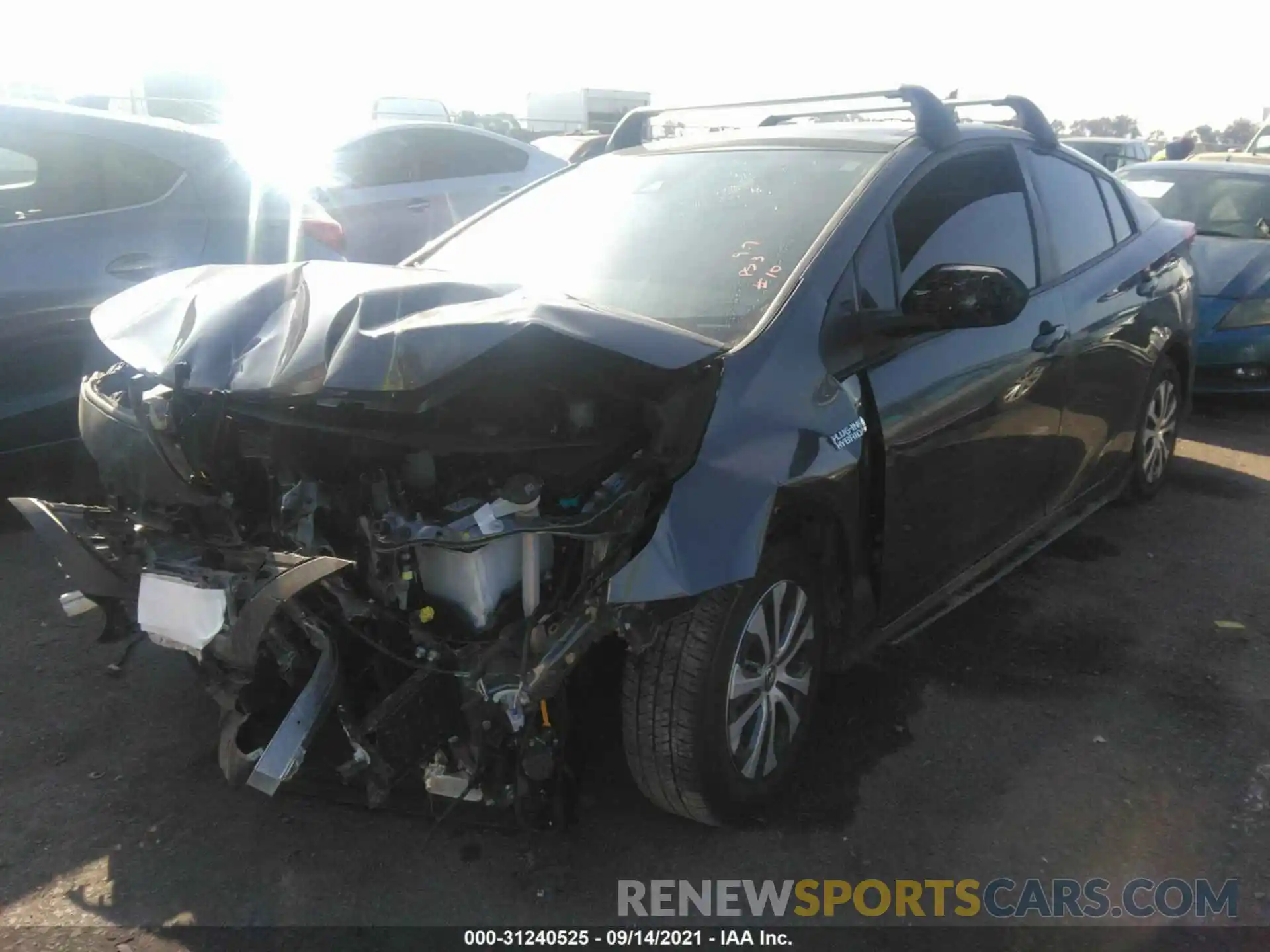 2 Photograph of a damaged car JTDKAMFP7M3185234 TOYOTA PRIUS PRIME 2021