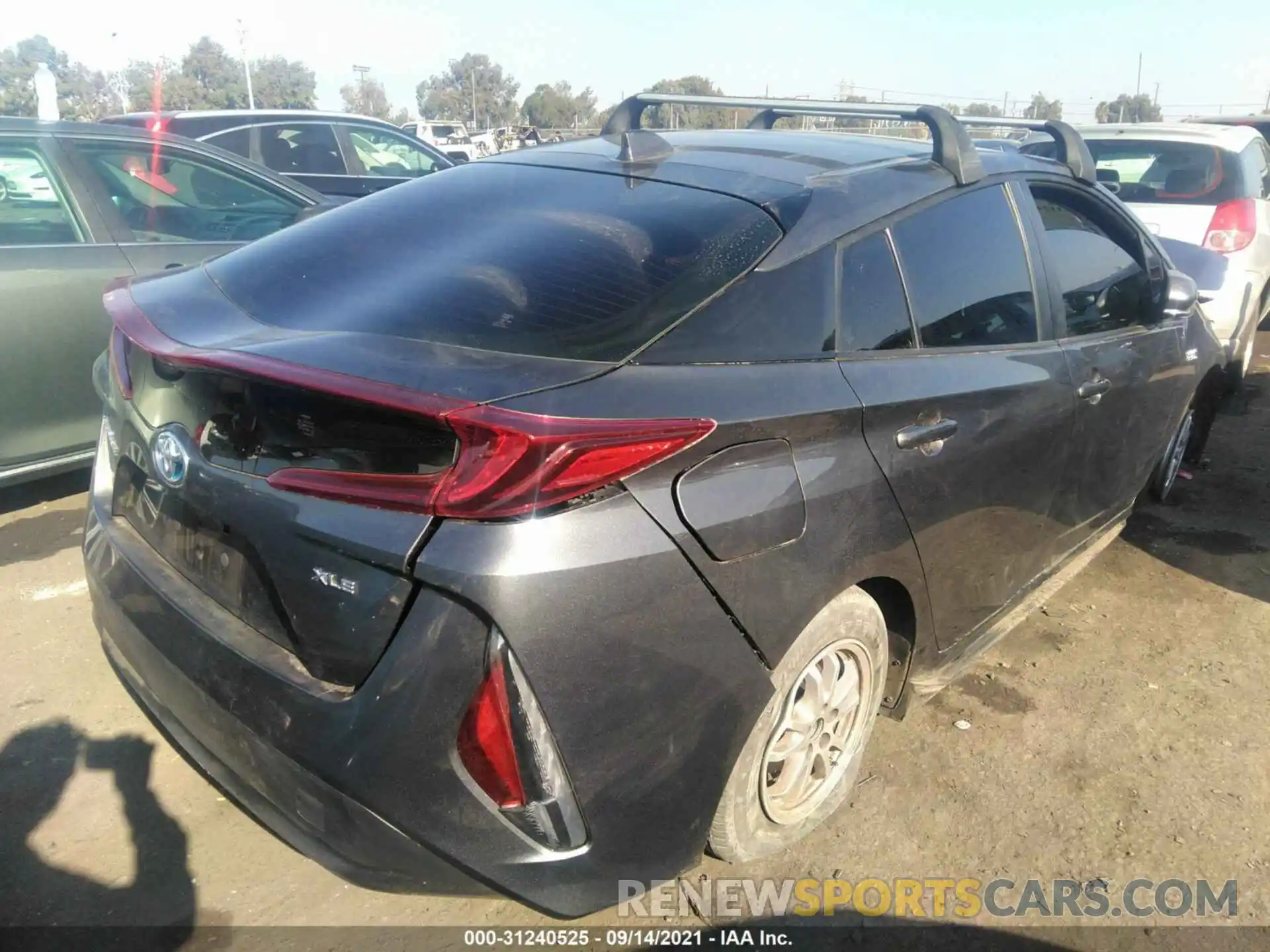 4 Photograph of a damaged car JTDKAMFP7M3185234 TOYOTA PRIUS PRIME 2021