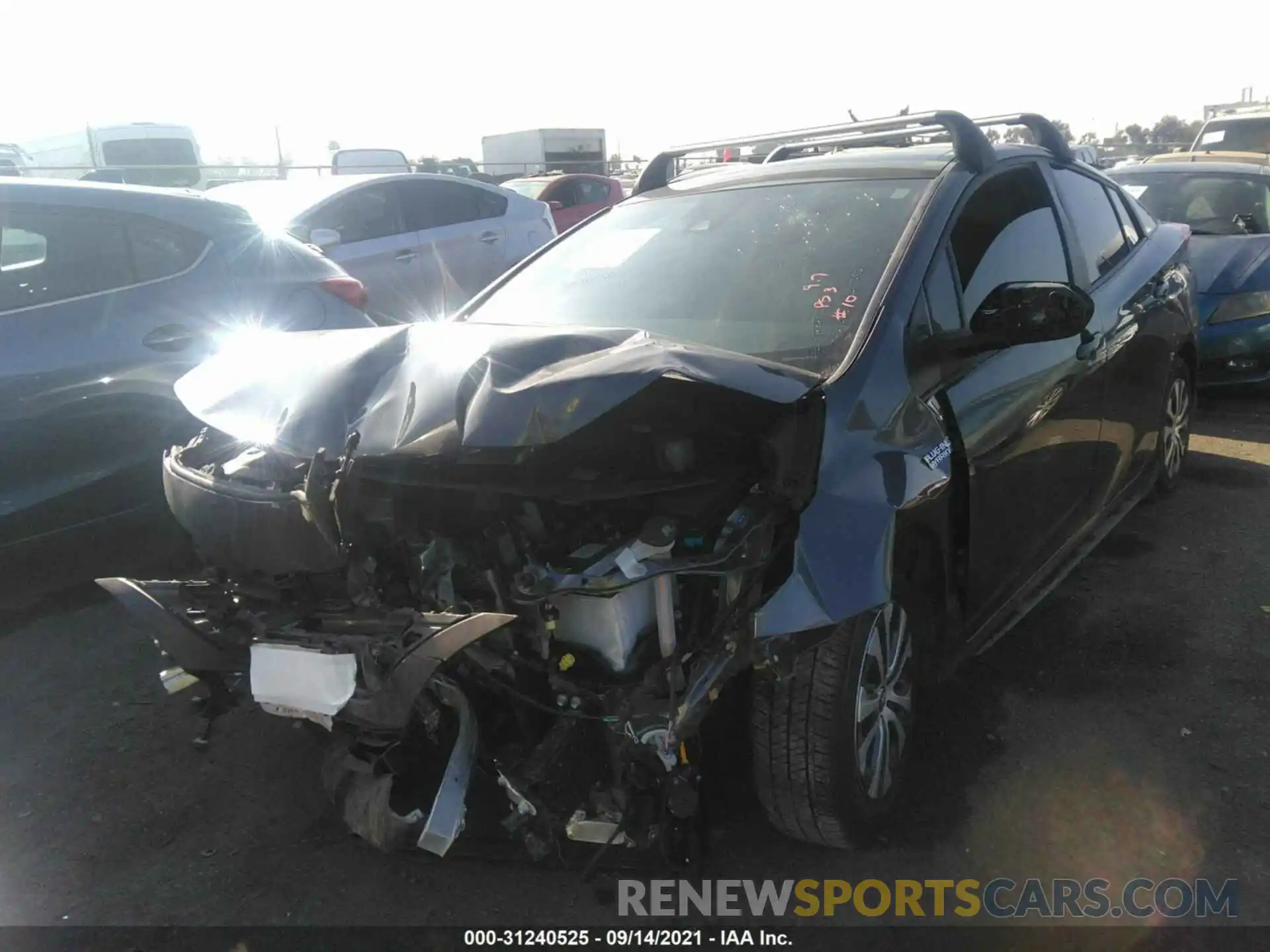 6 Photograph of a damaged car JTDKAMFP7M3185234 TOYOTA PRIUS PRIME 2021