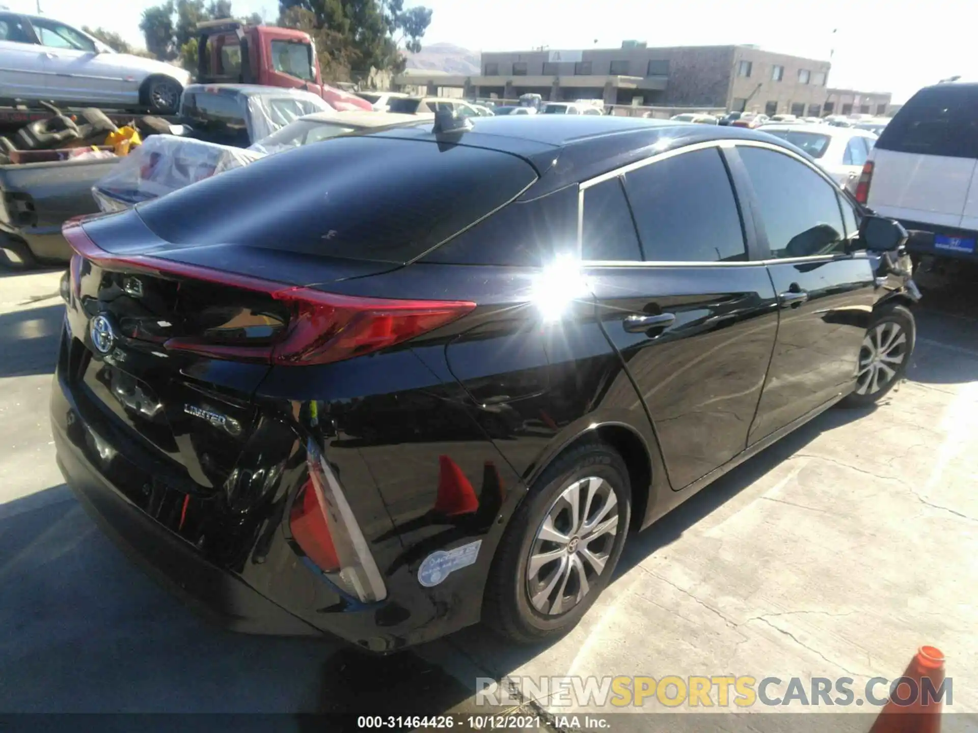 4 Photograph of a damaged car JTDKAMFP8M3184299 TOYOTA PRIUS PRIME 2021