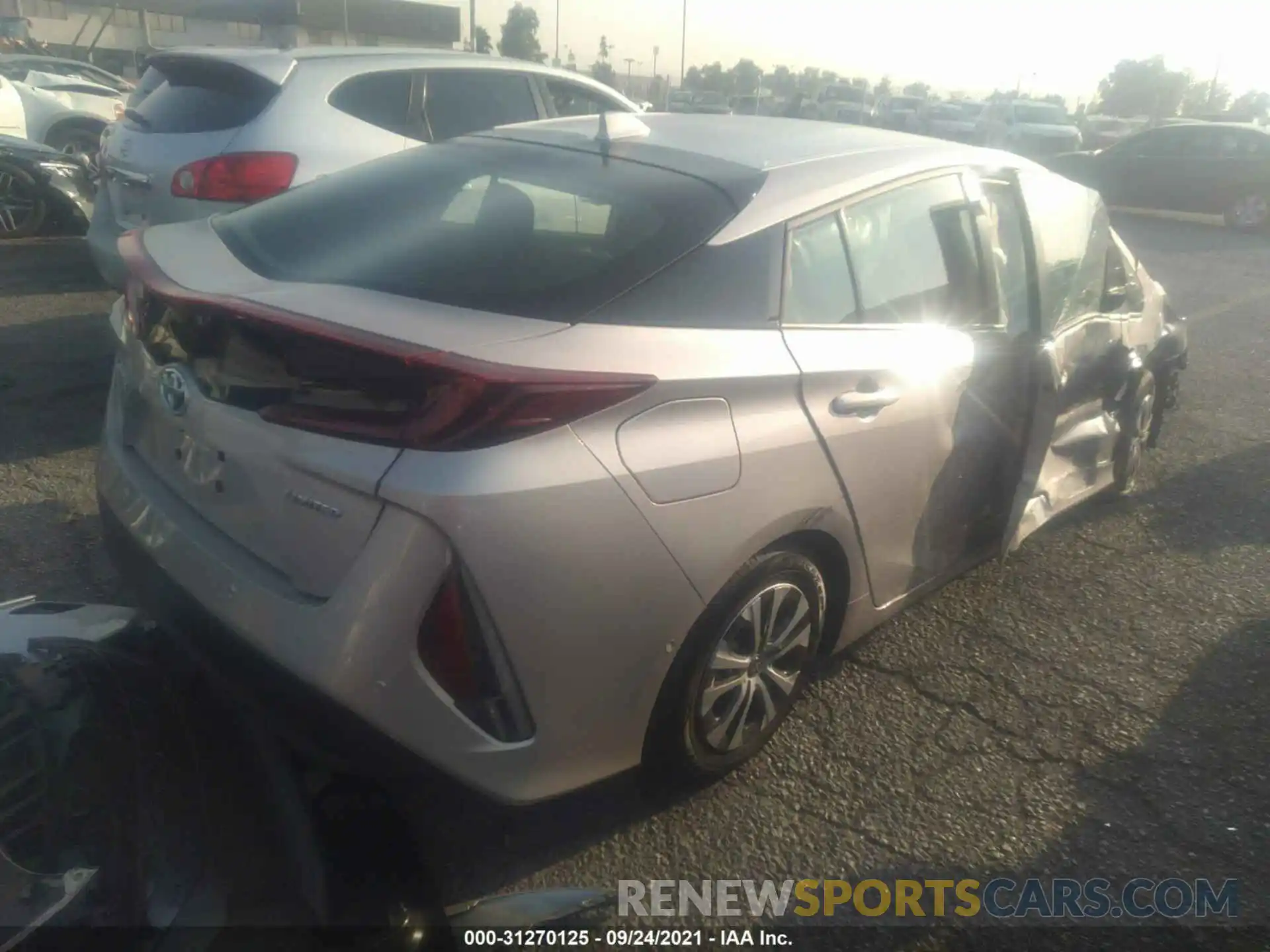 4 Photograph of a damaged car JTDKAMFP8M3193293 TOYOTA PRIUS PRIME 2021