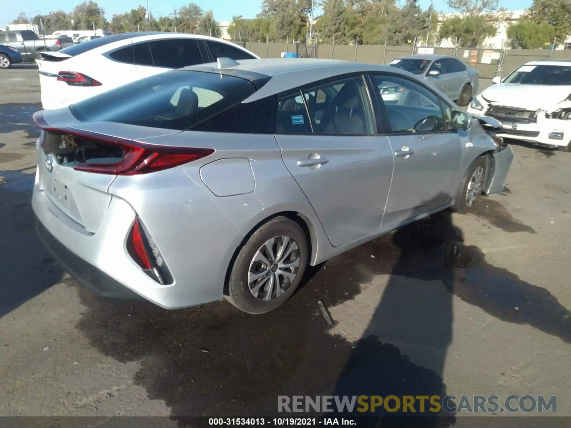 4 Photograph of a damaged car JTDKAMFP9M3165535 TOYOTA PRIUS PRIME 2021