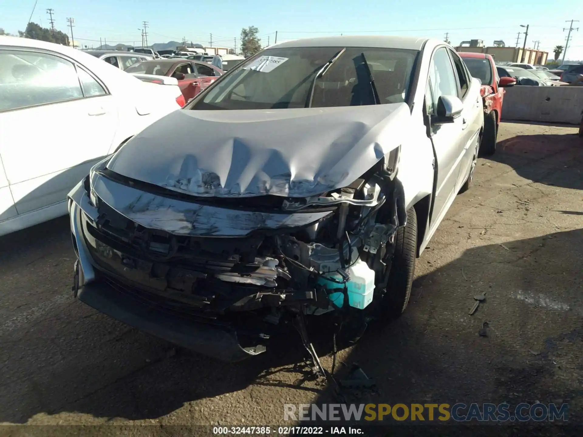 2 Photograph of a damaged car JTDKAMFP9M3190676 TOYOTA PRIUS PRIME 2021