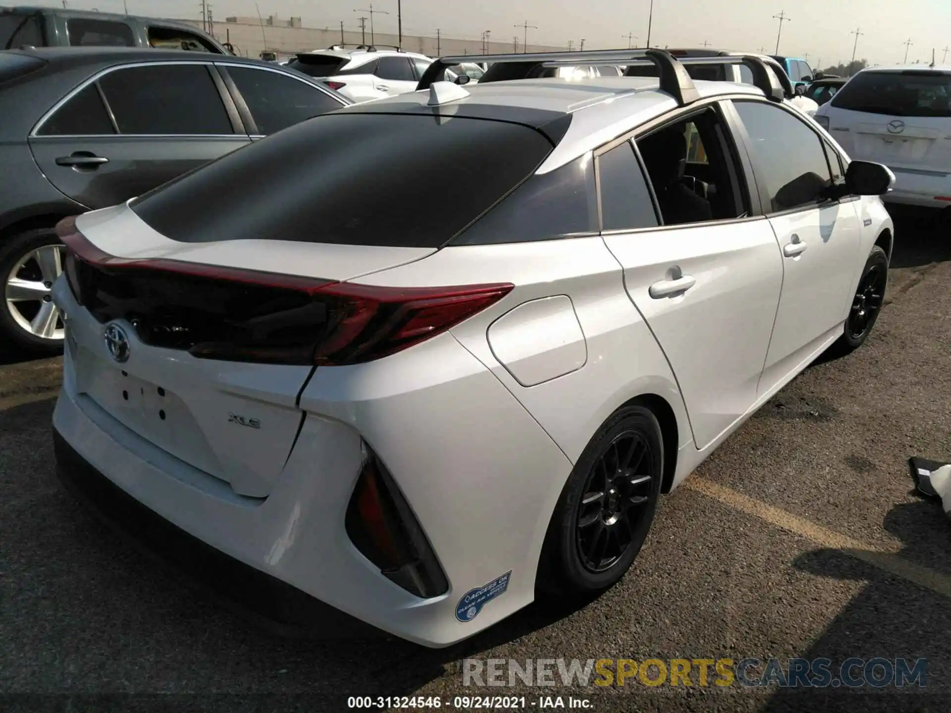 4 Фотография поврежденного автомобиля JTDKAMFPXM3172784 TOYOTA PRIUS PRIME 2021