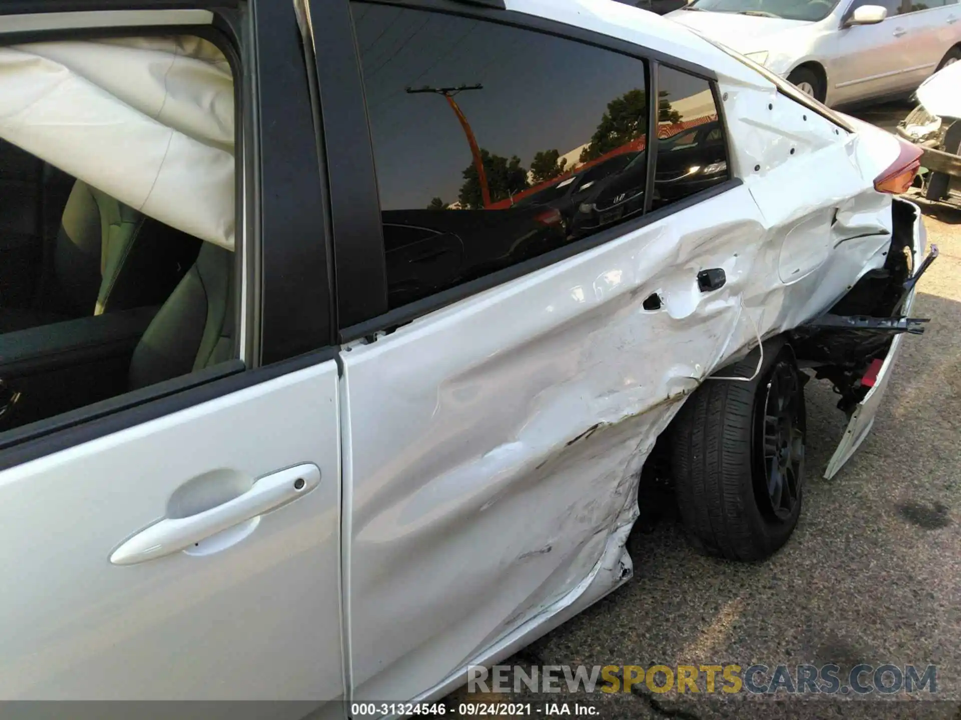 6 Photograph of a damaged car JTDKAMFPXM3172784 TOYOTA PRIUS PRIME 2021