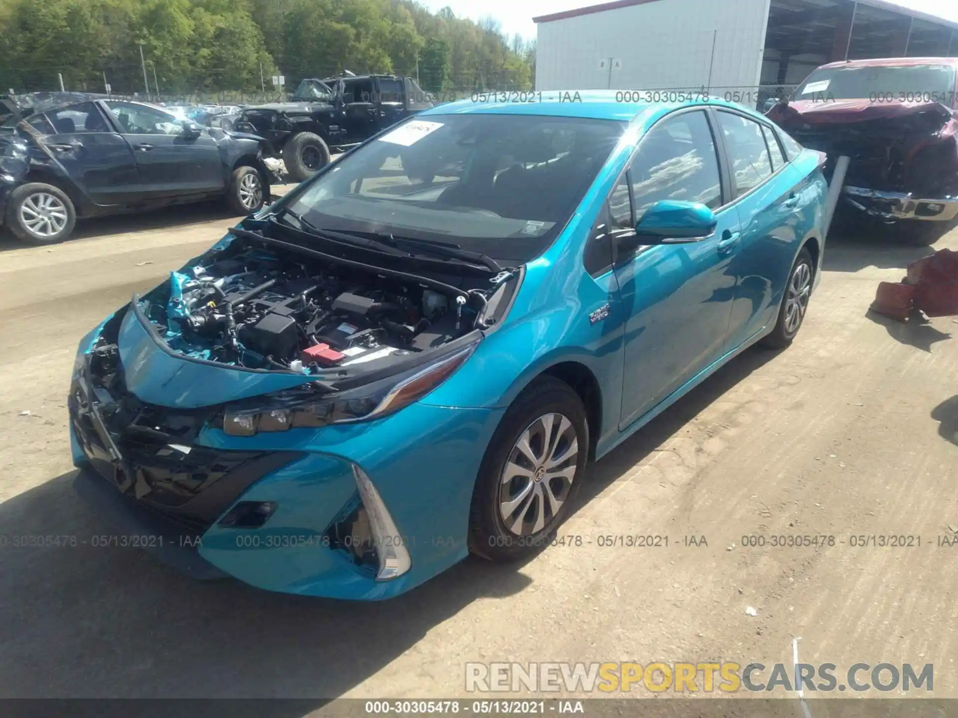 2 Photograph of a damaged car JTDKAMFPXM3173658 TOYOTA PRIUS PRIME 2021