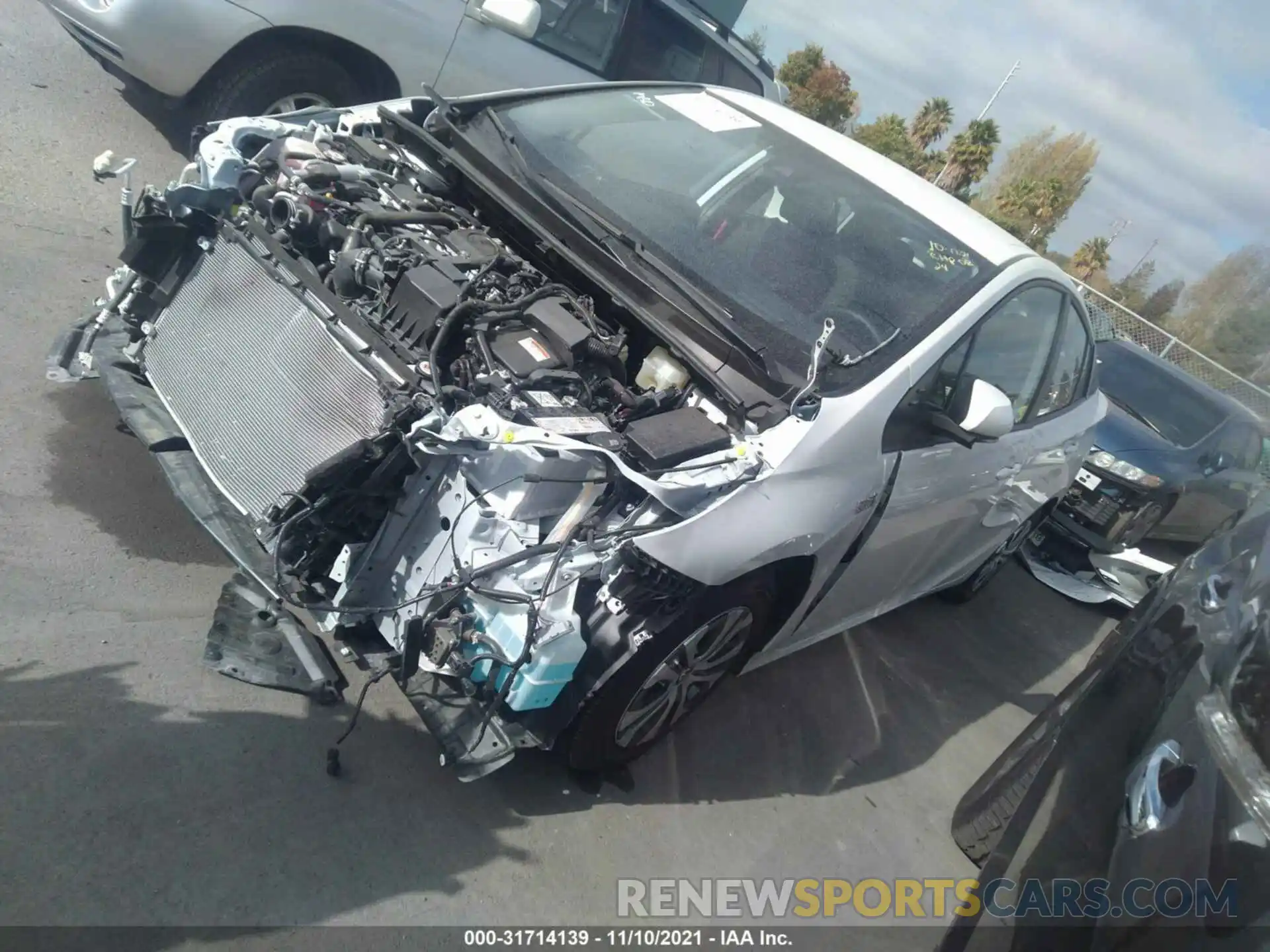 2 Photograph of a damaged car JTDKAMFPXM3180884 TOYOTA PRIUS PRIME 2021