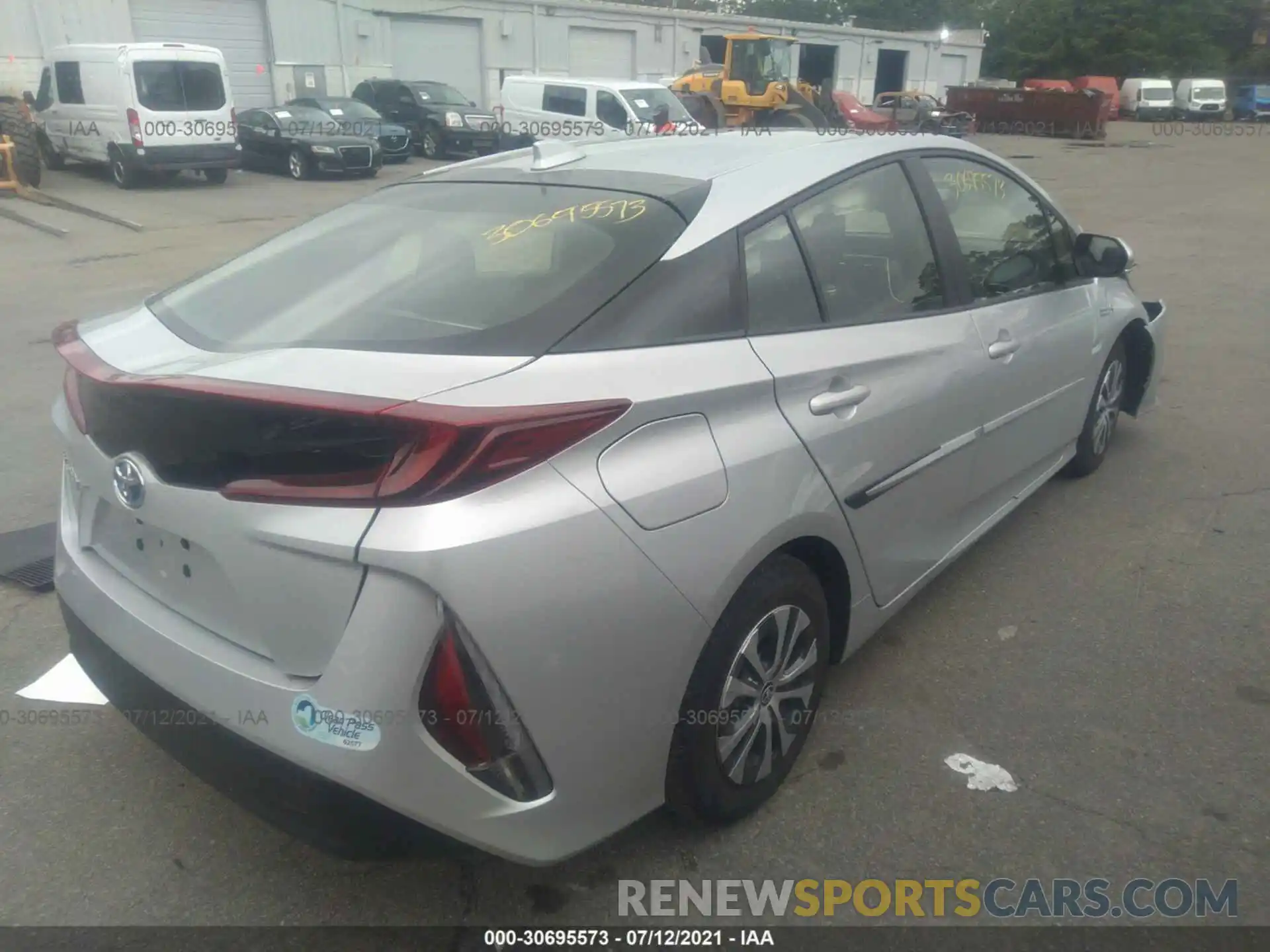 4 Photograph of a damaged car JTDKAMFPXM3181873 TOYOTA PRIUS PRIME 2021