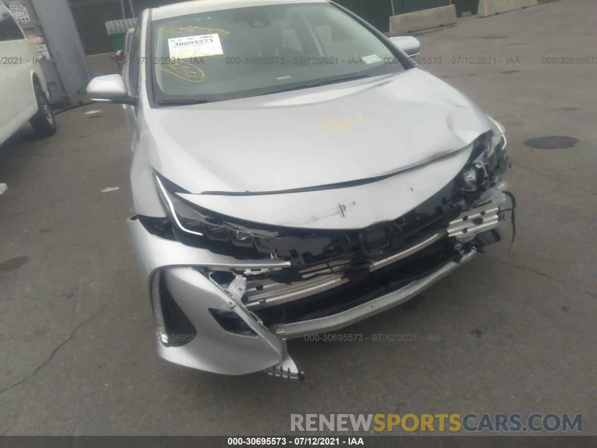 6 Photograph of a damaged car JTDKAMFPXM3181873 TOYOTA PRIUS PRIME 2021