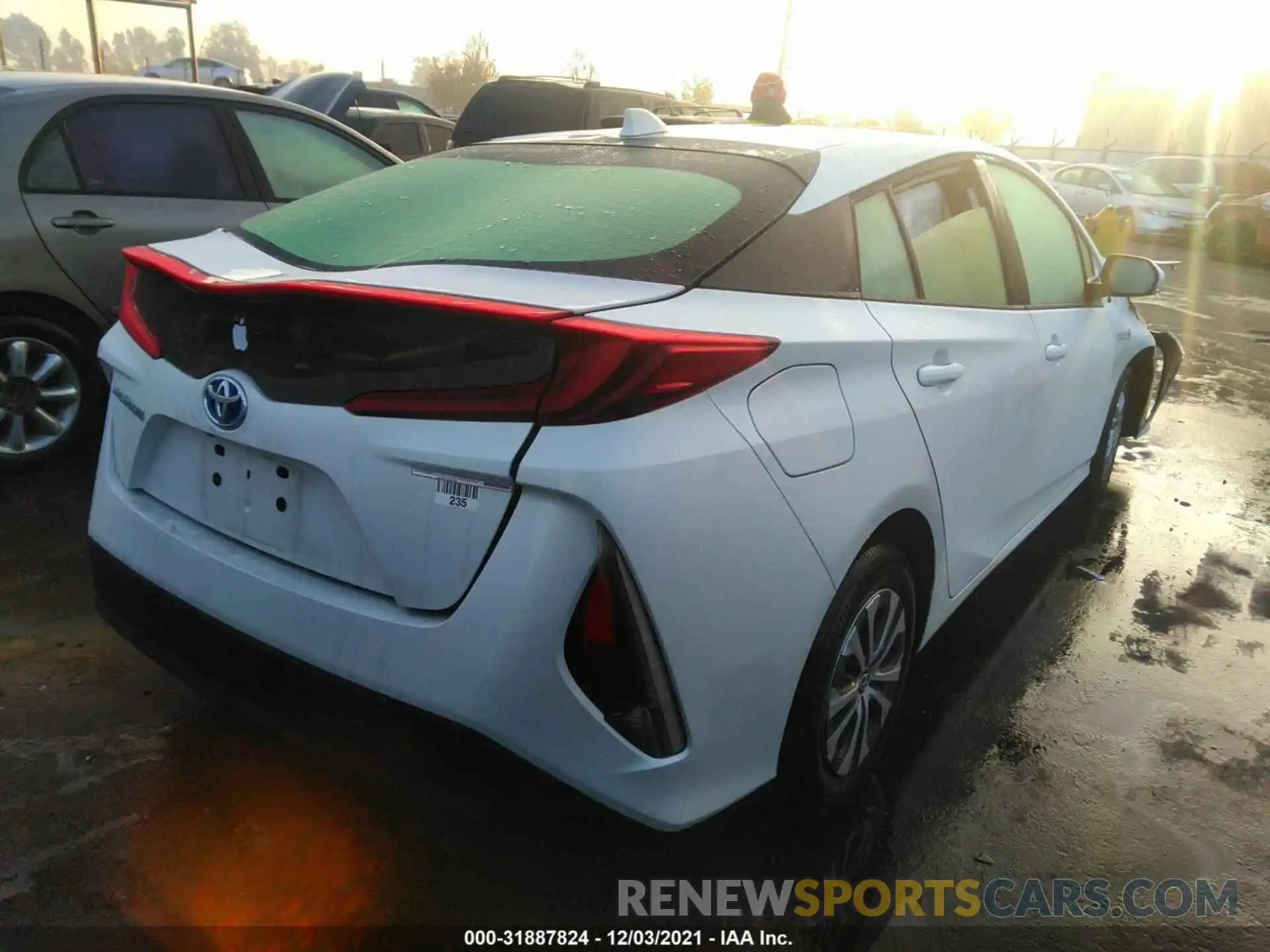 4 Photograph of a damaged car JTDKAMFPXM3183140 TOYOTA PRIUS PRIME 2021