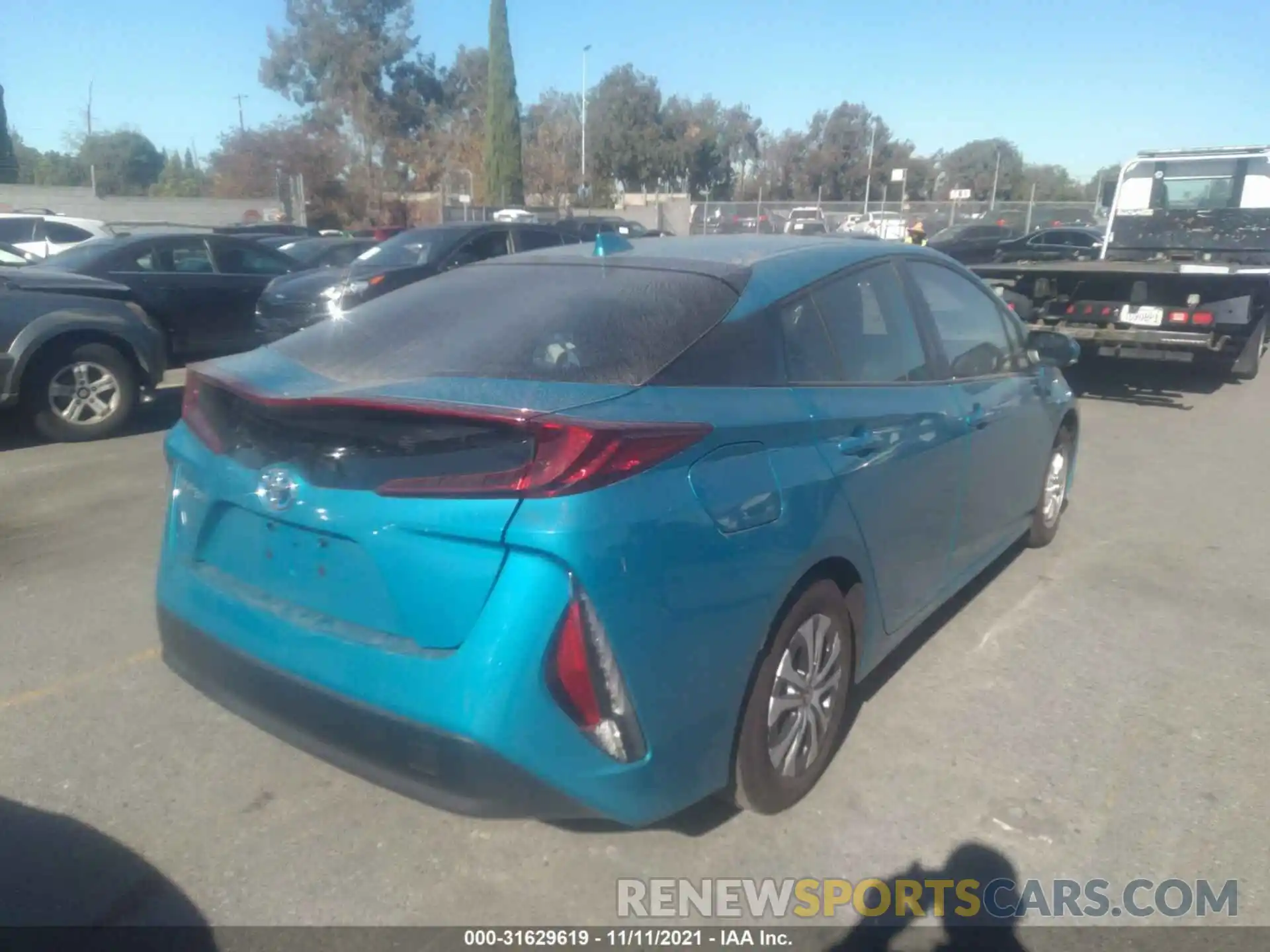 4 Photograph of a damaged car JTDKAMFPXM3194851 TOYOTA PRIUS PRIME 2021