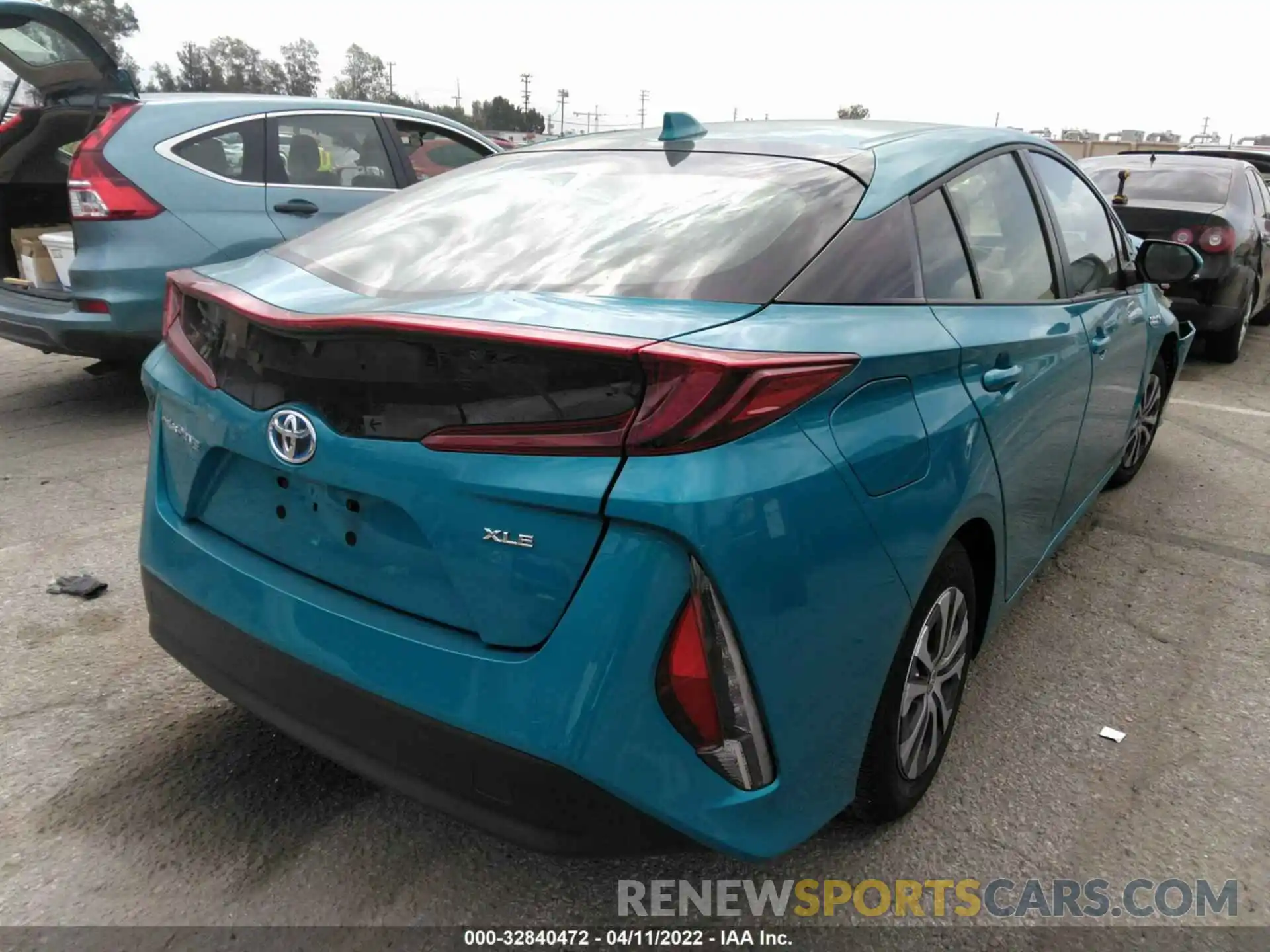 4 Photograph of a damaged car JTDKAMFP3N3209370 TOYOTA PRIUS PRIME 2022