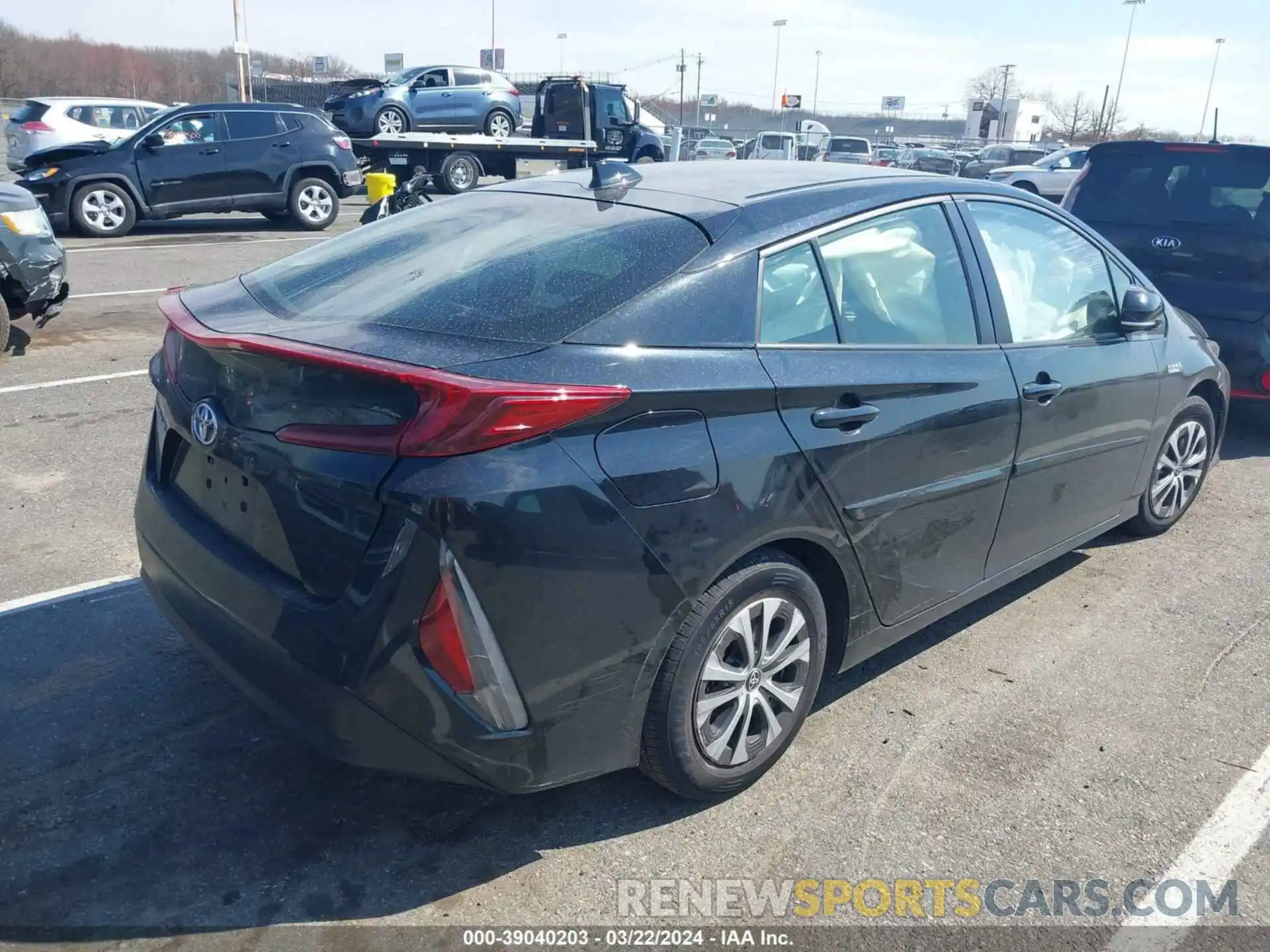 4 Photograph of a damaged car JTDKAMFP7N3210327 TOYOTA PRIUS PRIME 2022