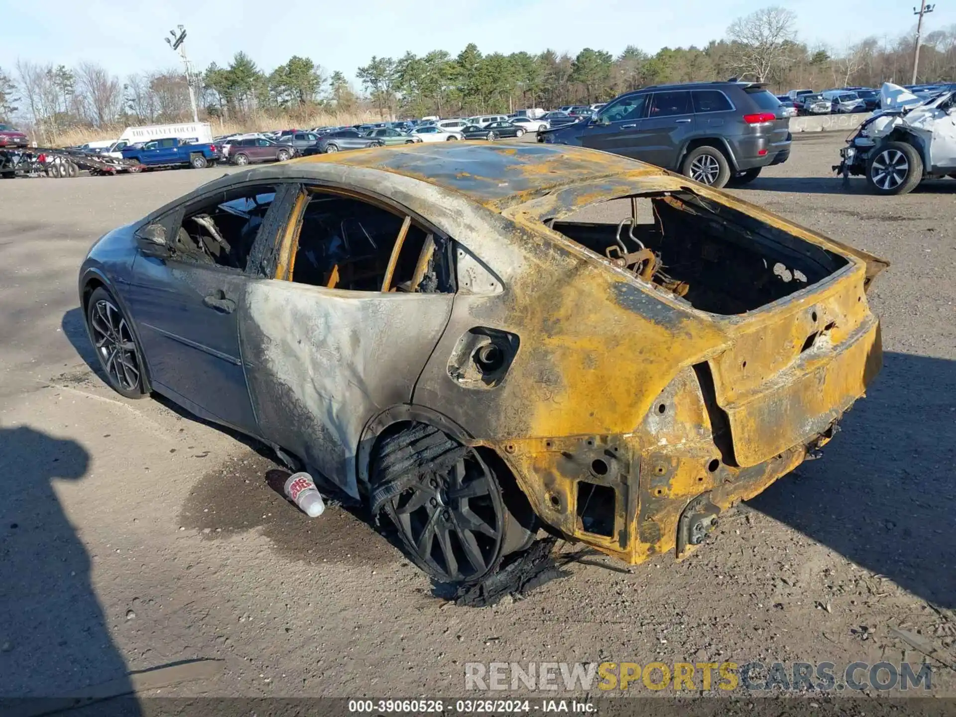 3 Photograph of a damaged car JTDACACU2P3000834 TOYOTA PRIUS PRIME 2023