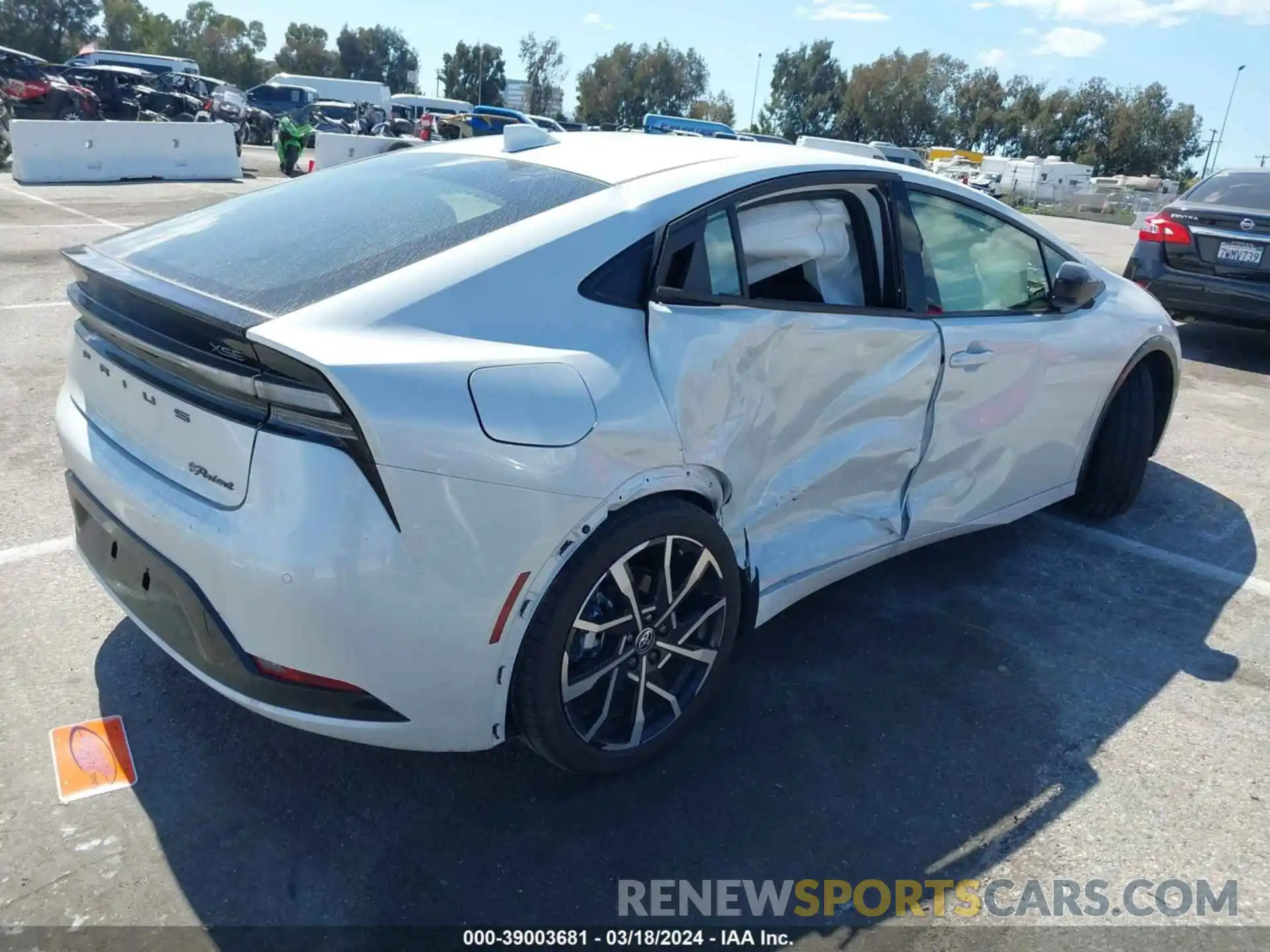 4 Photograph of a damaged car JTDACACU6R3016148 TOYOTA PRIUS PRIME 2024