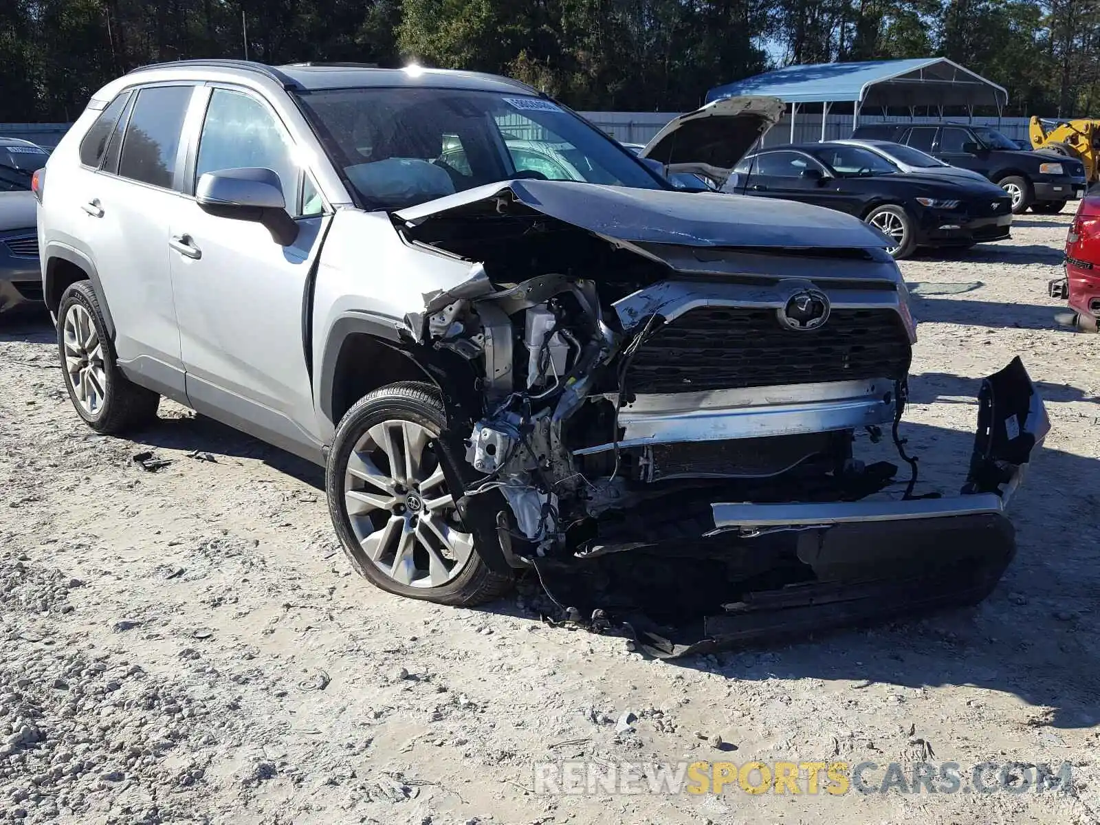 1 Photograph of a damaged car 2T3C1RFV0KW007112 TOYOTA RAV4 2019