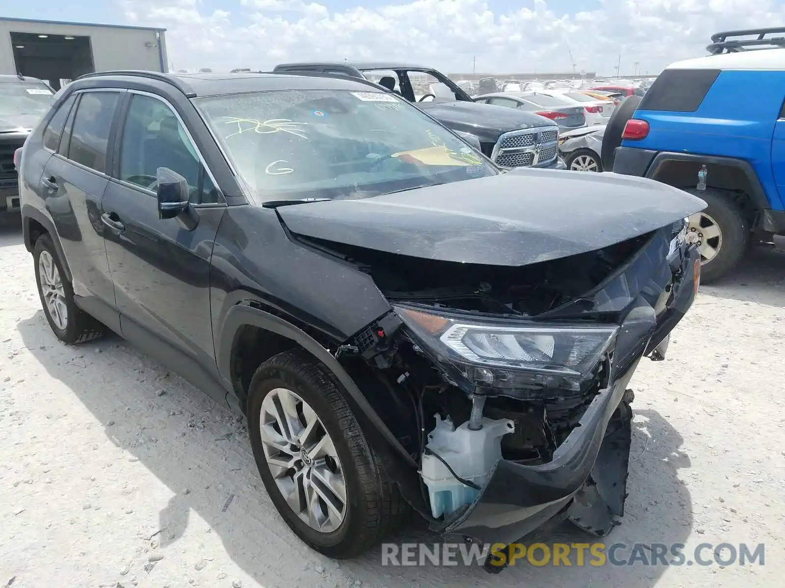 1 Photograph of a damaged car 2T3C1RFV0KW054138 TOYOTA RAV4 2019