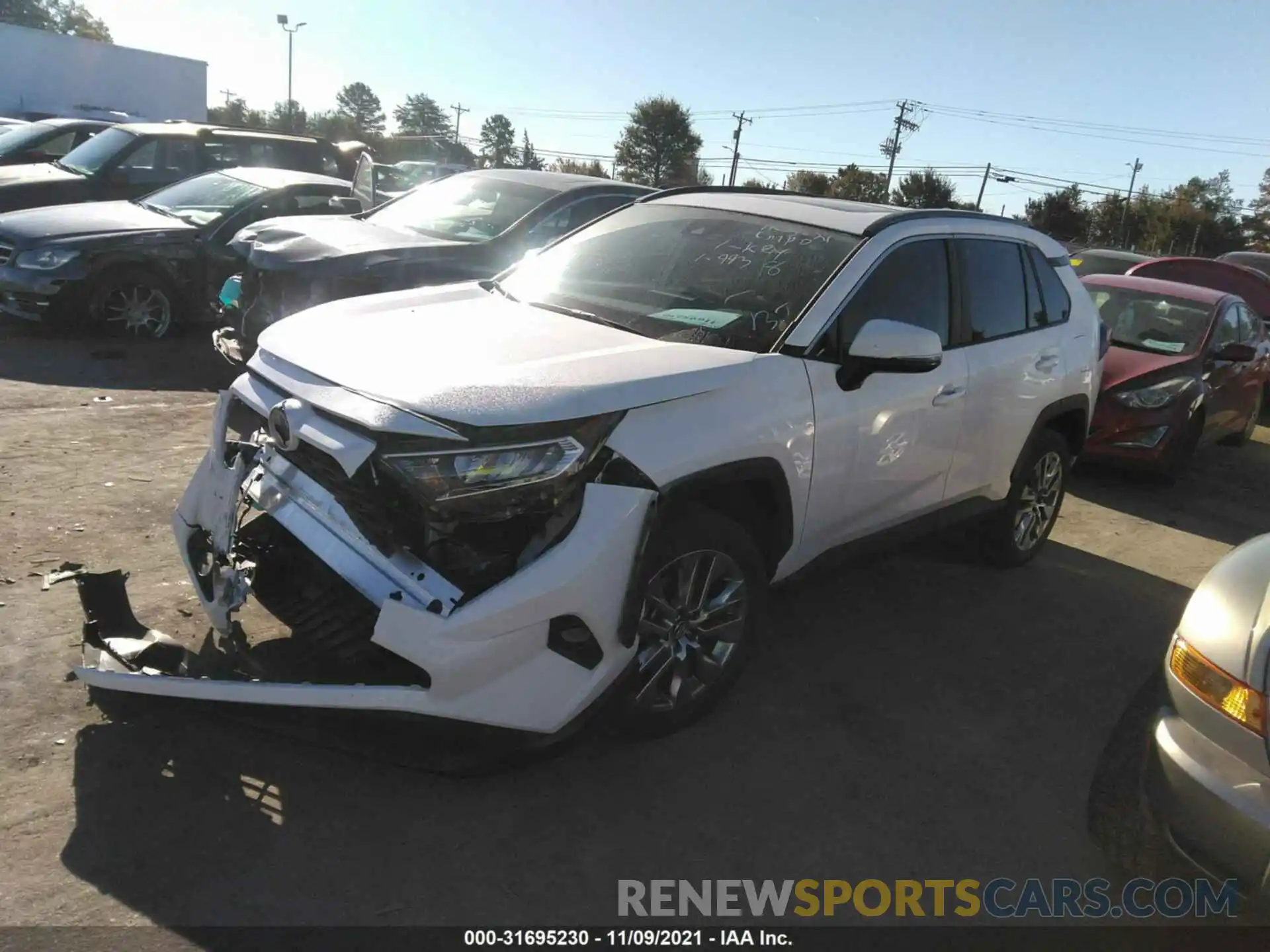 2 Фотография поврежденного автомобиля 2T3C1RFV2KC018579 TOYOTA RAV4 2019