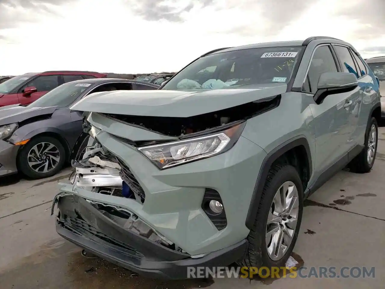 2 Photograph of a damaged car 2T3C1RFV2KC028349 TOYOTA RAV4 2019