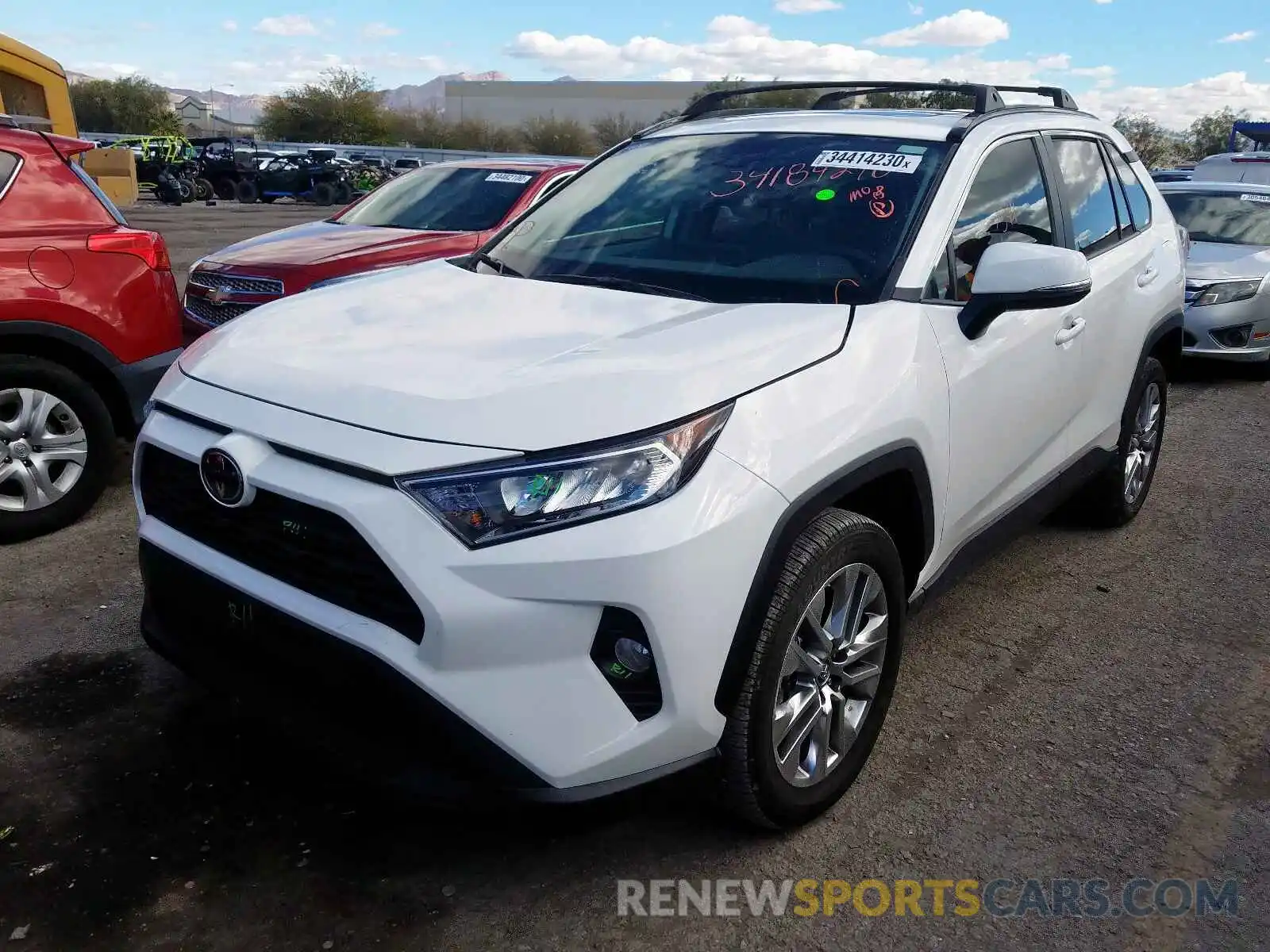 2 Фотография поврежденного автомобиля 2T3C1RFV7KW023680 TOYOTA RAV4 2019