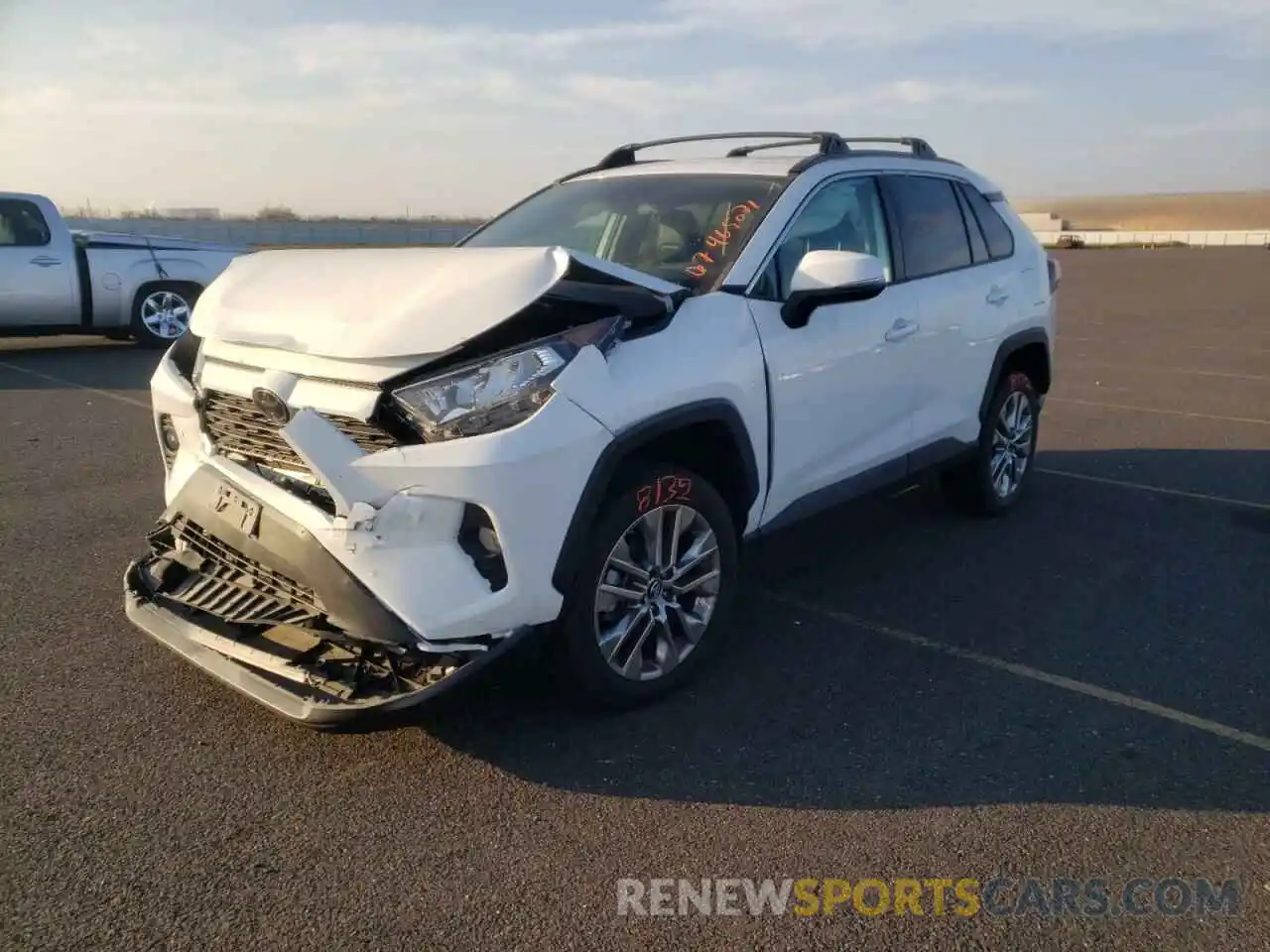 2 Photograph of a damaged car 2T3C1RFV7KW025641 TOYOTA RAV4 2019