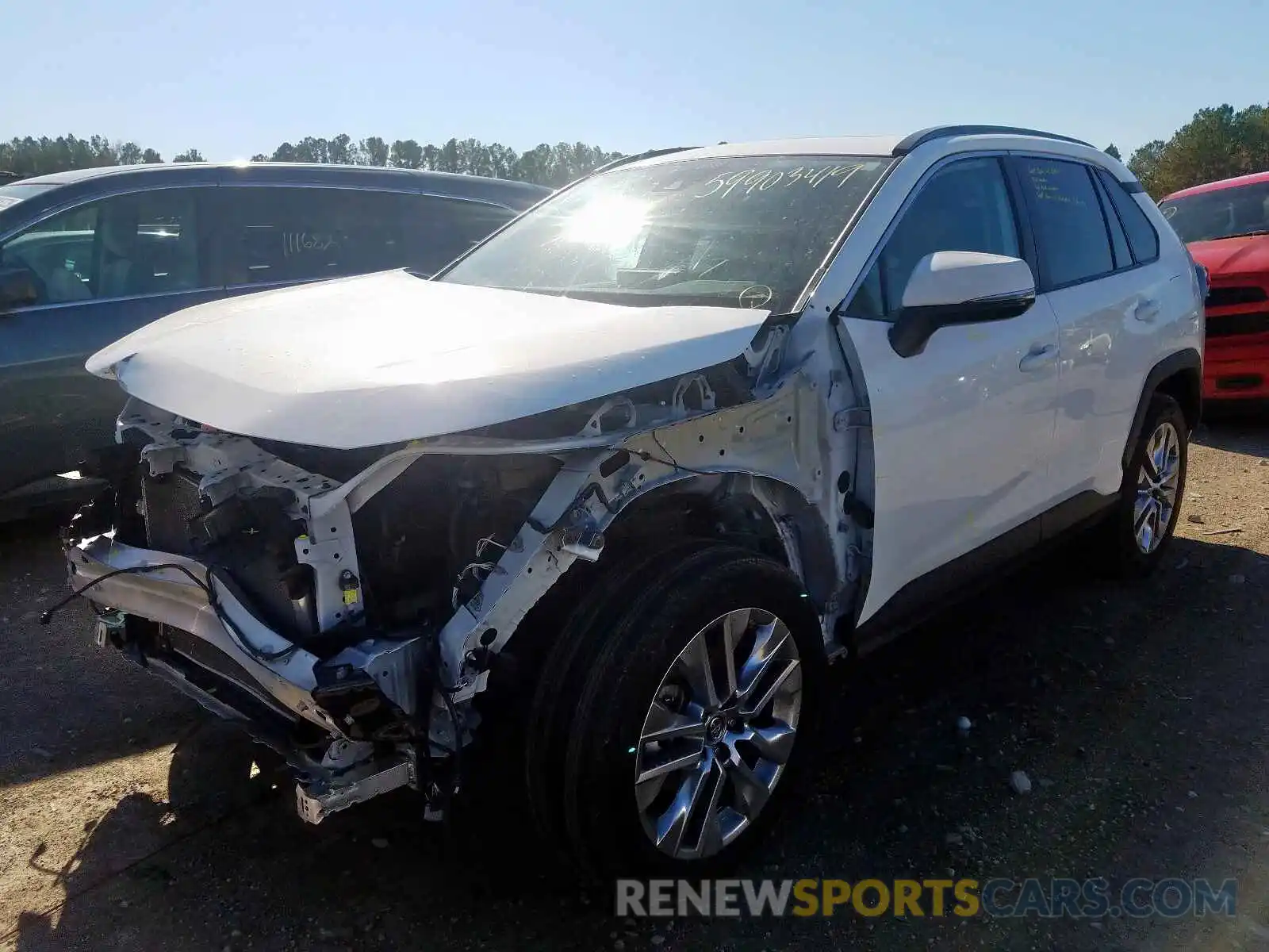 2 Photograph of a damaged car 2T3C1RFV8KW012333 TOYOTA RAV4 2019