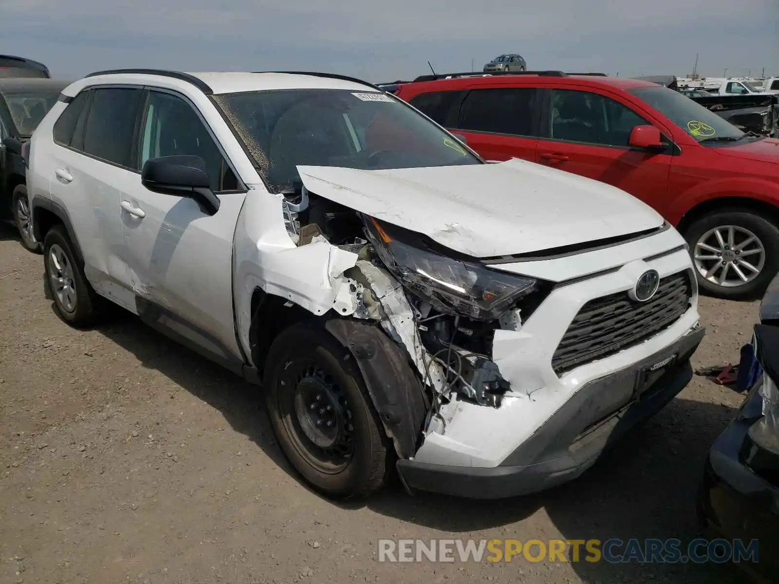 1 Photograph of a damaged car 2T3F1RFV0KC013975 TOYOTA RAV4 2019