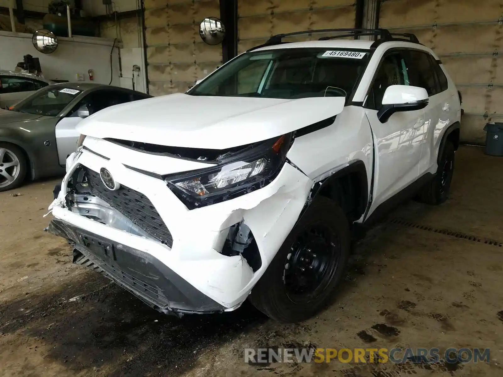 2 Photograph of a damaged car 2T3G1RFV0KC060556 TOYOTA RAV4 2019