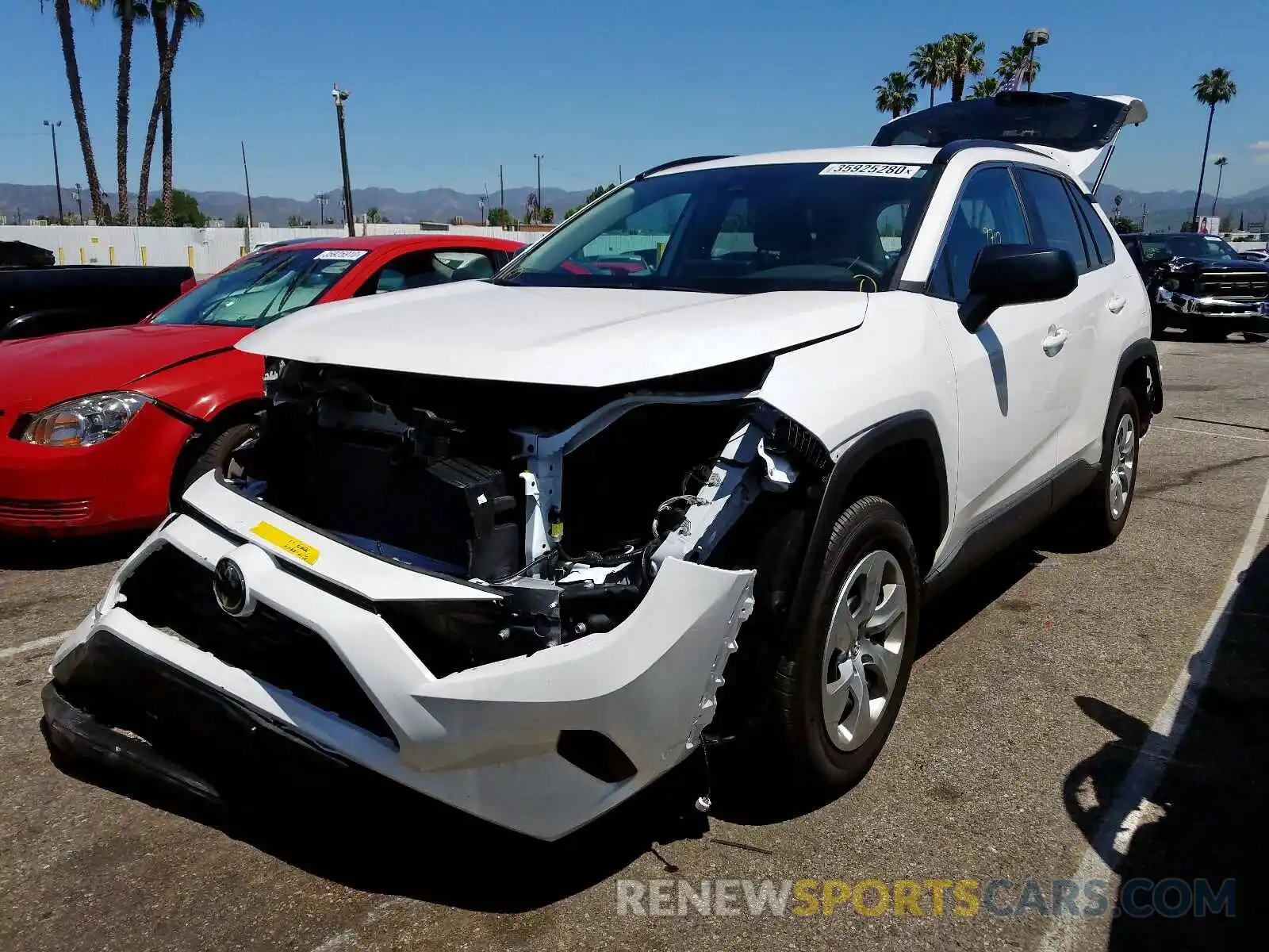 2 Photograph of a damaged car 2T3H1RFV5KC031199 TOYOTA RAV4 2019