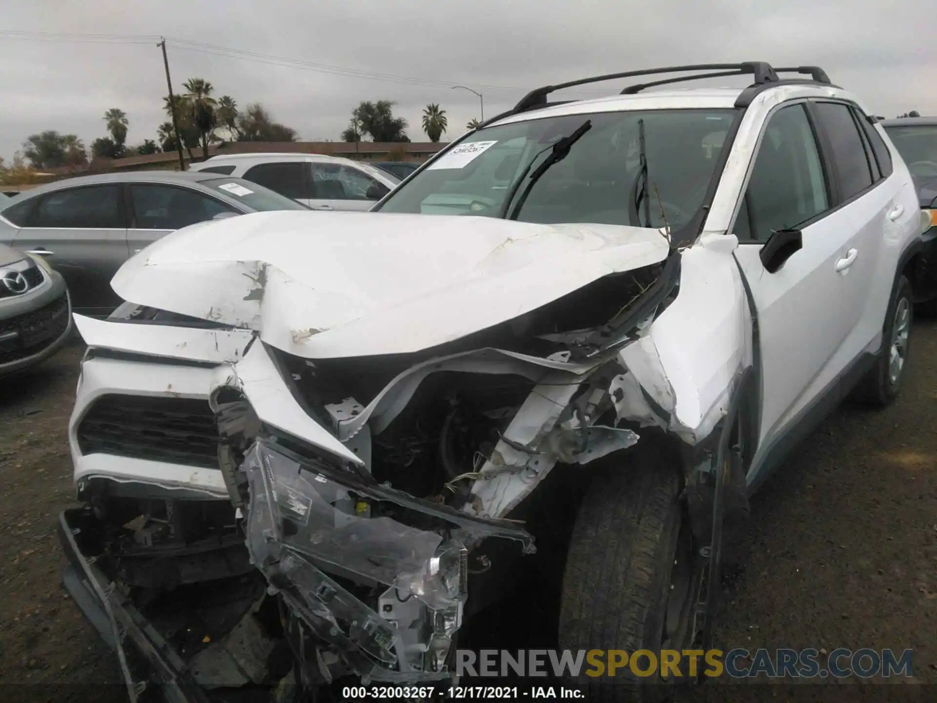 2 Photograph of a damaged car 2T3K1RFV0KW012869 TOYOTA RAV4 2019