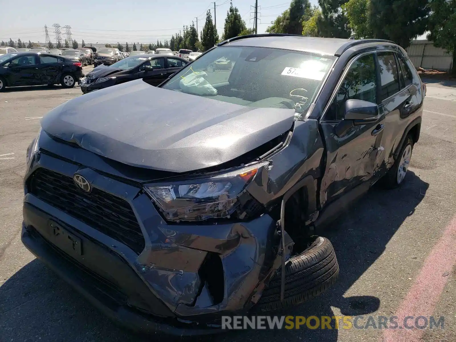 2 Photograph of a damaged car 2T3K1RFV5KC013825 TOYOTA RAV4 2019