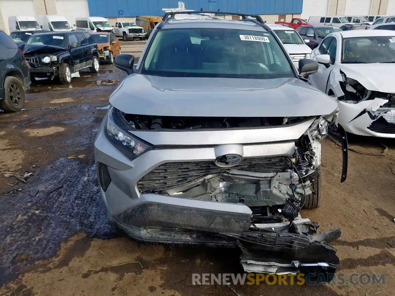 7 Photograph of a damaged car 2T3LWRFV2KW016864 TOYOTA RAV4 2019