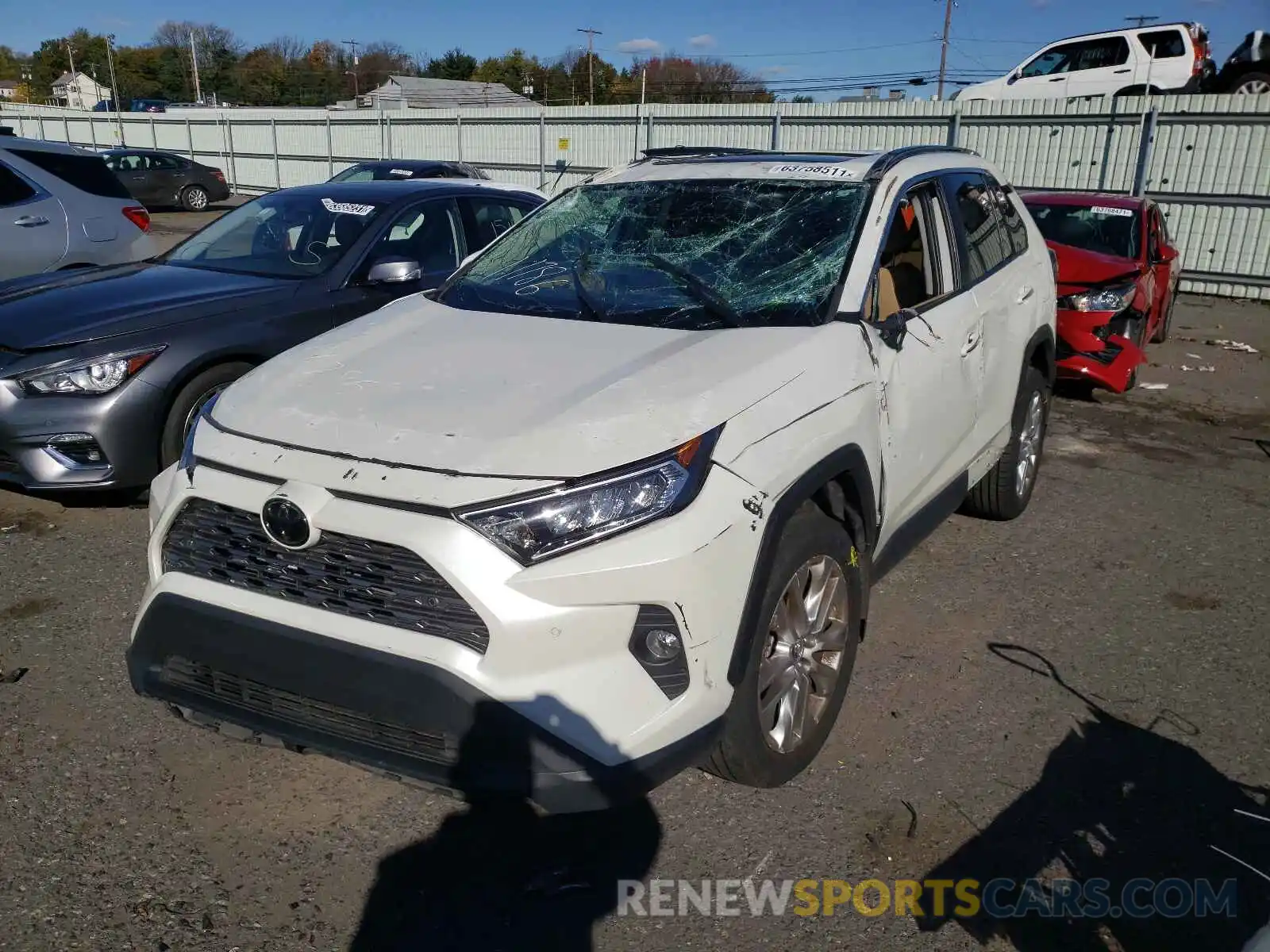 2 Photograph of a damaged car 2T3N1RFV4KC030869 TOYOTA RAV4 2019