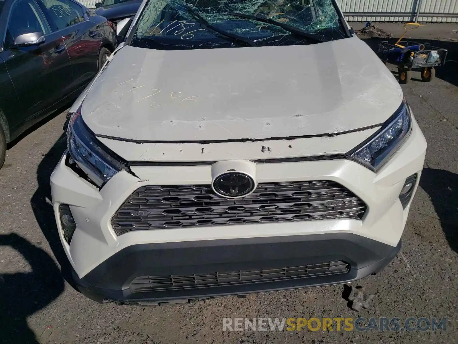 7 Photograph of a damaged car 2T3N1RFV4KC030869 TOYOTA RAV4 2019