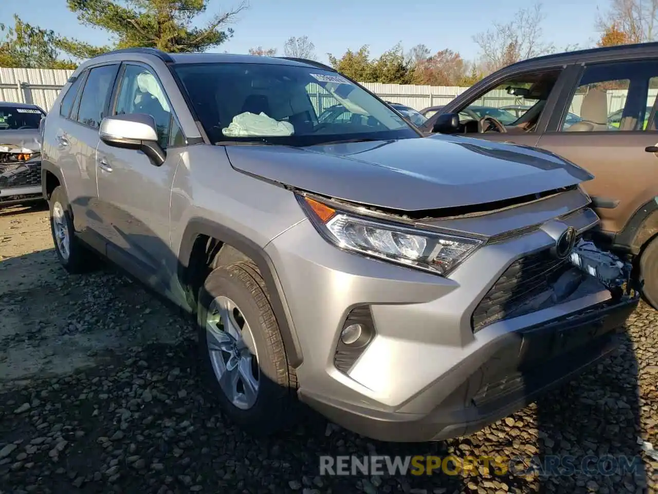 1 Photograph of a damaged car 2T3W1RFV0KC009053 TOYOTA RAV4 2019