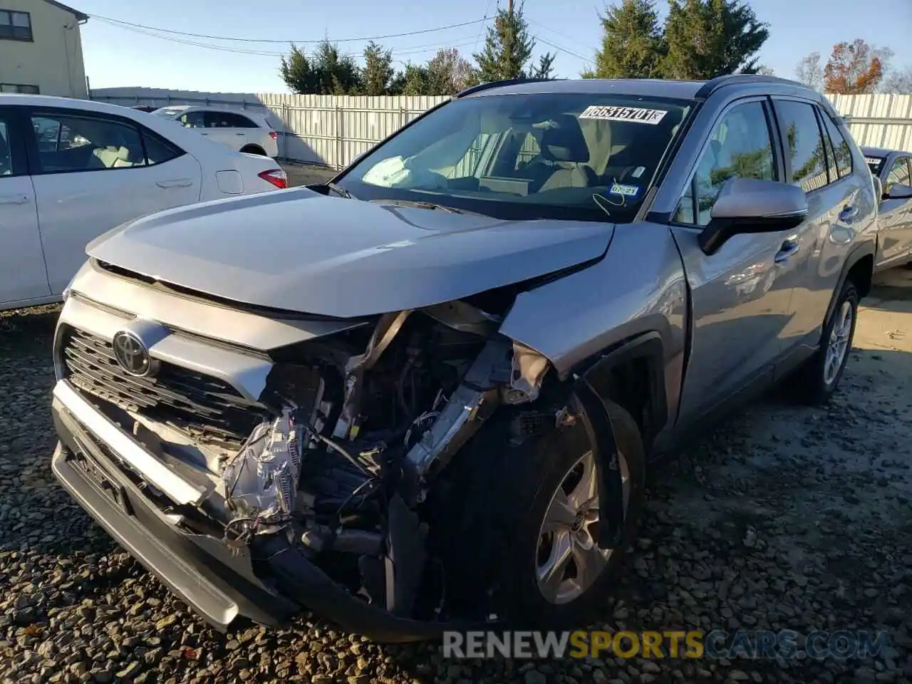 2 Photograph of a damaged car 2T3W1RFV0KC009053 TOYOTA RAV4 2019