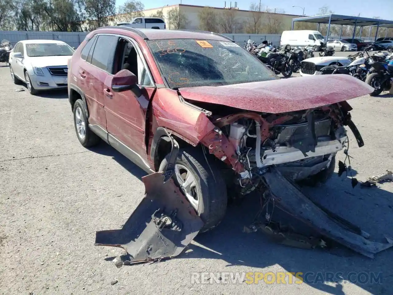 1 Photograph of a damaged car 2T3W1RFV0KC021459 TOYOTA RAV4 2019